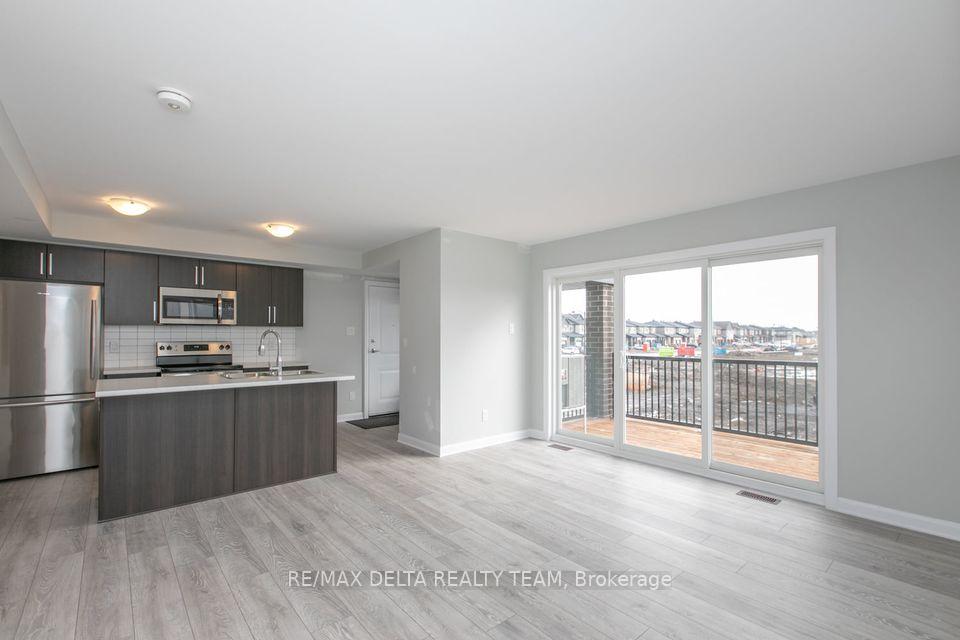 Photo 4 of Unit Unit D, 701 Amberwing Private, Ottawa, Avalon West — HOMEH