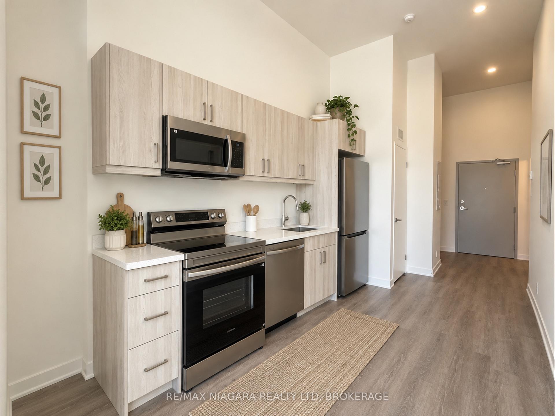 Photo 6 of Unit 129, 350 Prince Charles Drive S, Welland, Broadway — HOMEH