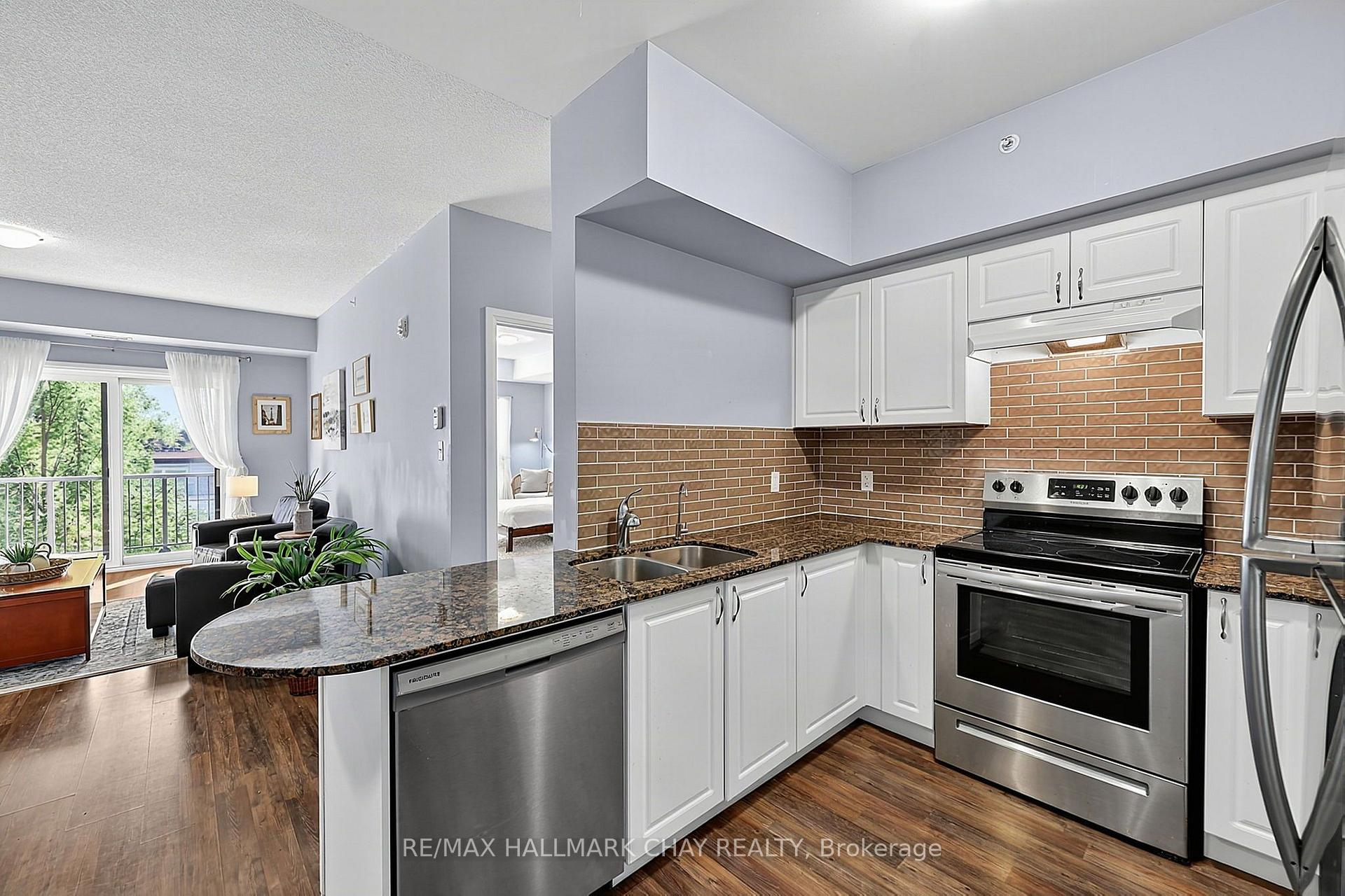 Photo 8 of Unit 210, 161 Wellington Street E, New Tecumseth, Alliston — HOMEH