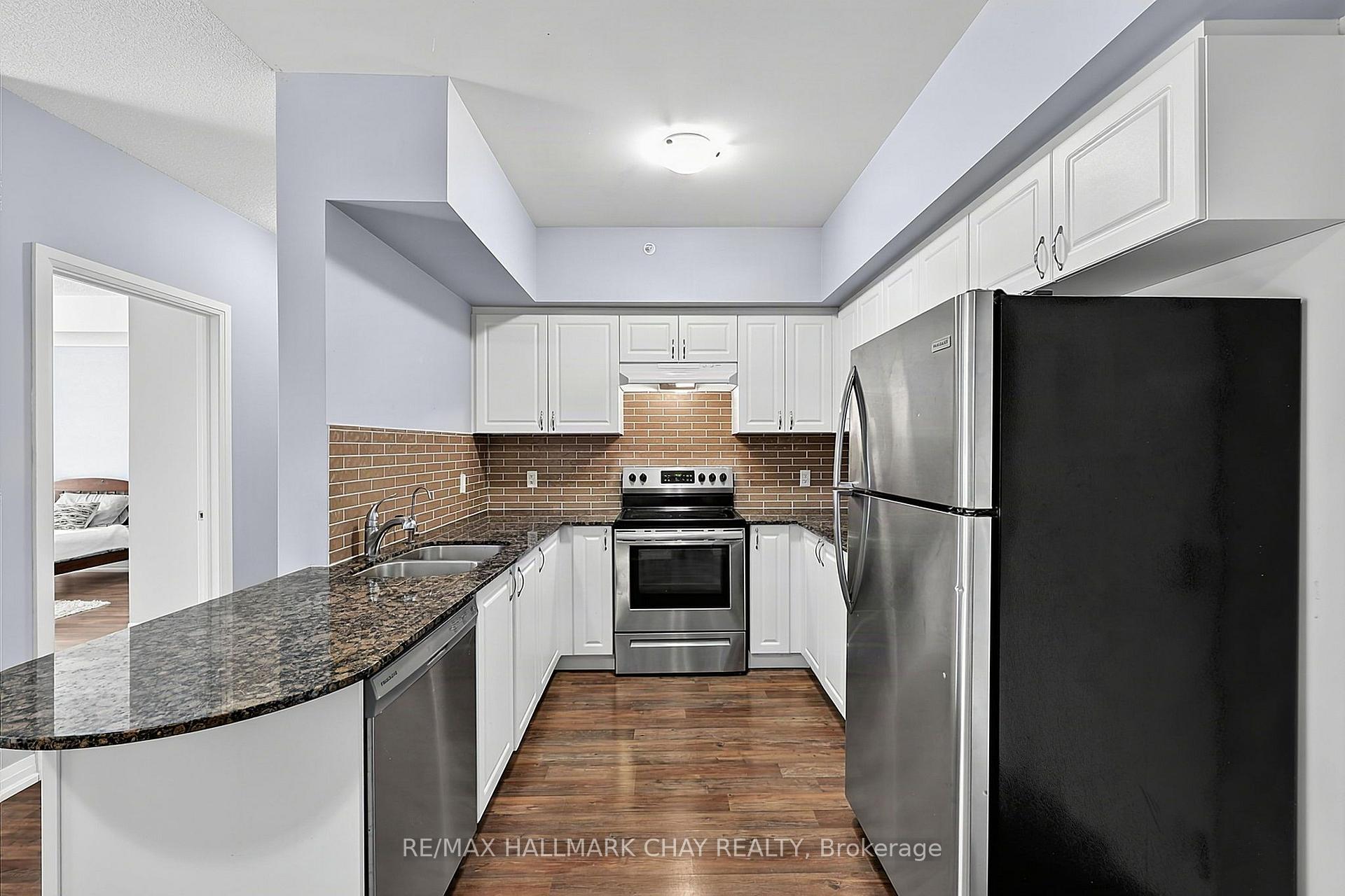 Photo 9 of Unit 210, 161 Wellington Street E, New Tecumseth, Alliston — HOMEH