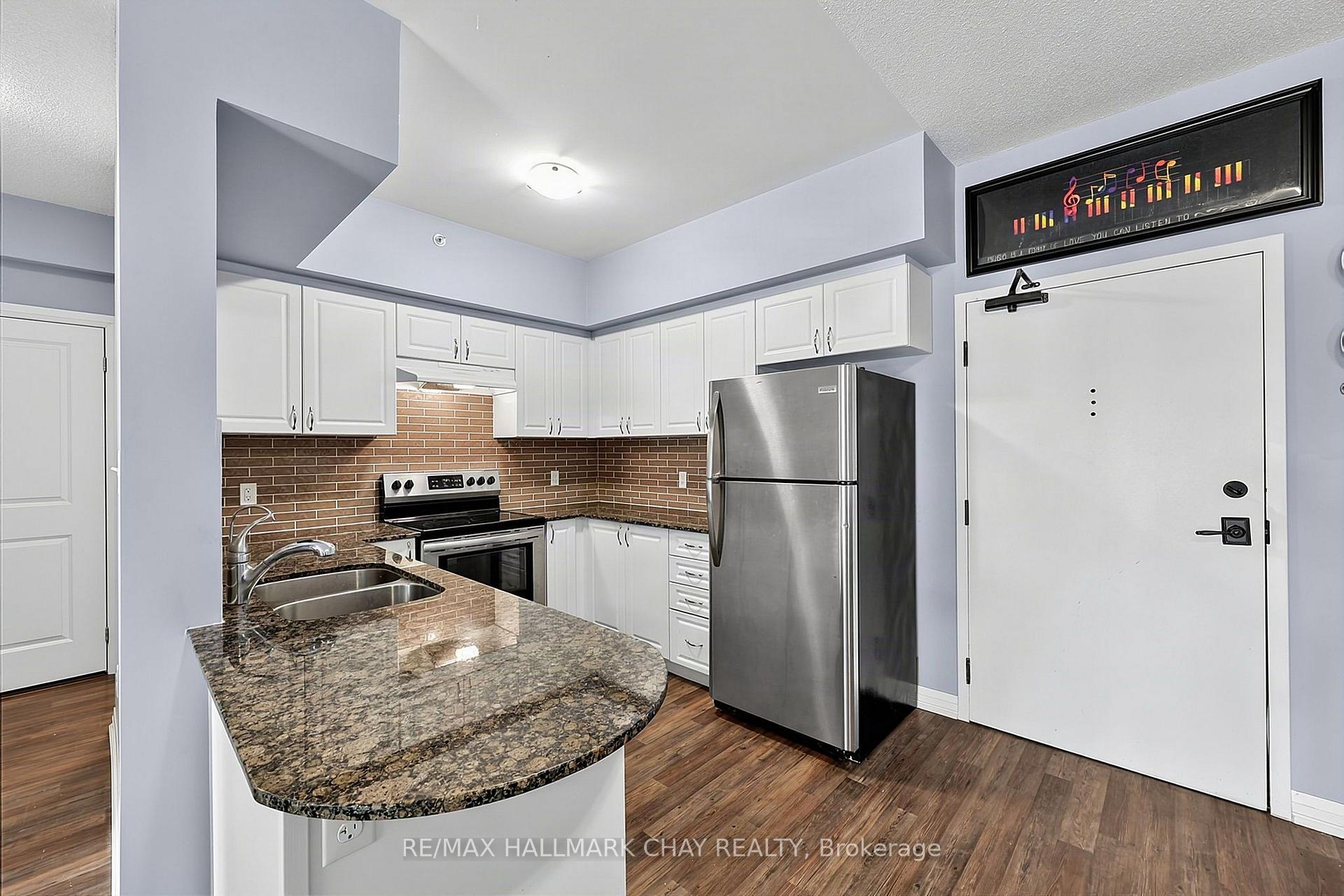 Photo 10 of Unit 210, 161 Wellington Street E, New Tecumseth, Alliston — HOMEH