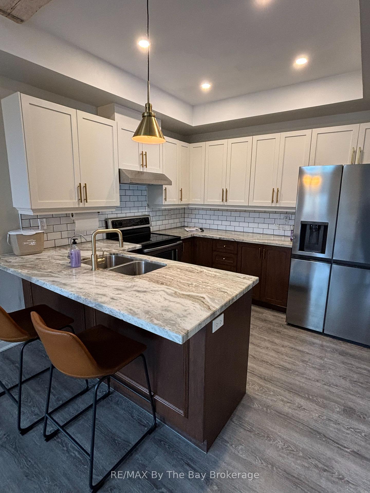 Photo 5 of 300 Stonebridge Boulevard, Wasaga Beach — HOMEH