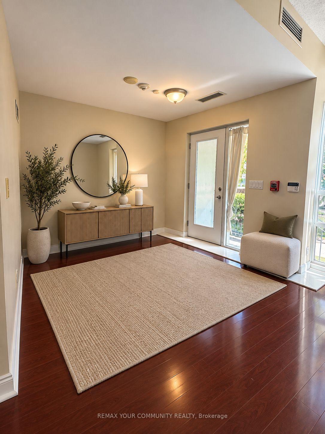 Photo 2 of Unit TH 128, 70 Absolute Avenue, Mississauga, City Centre — HOMEH