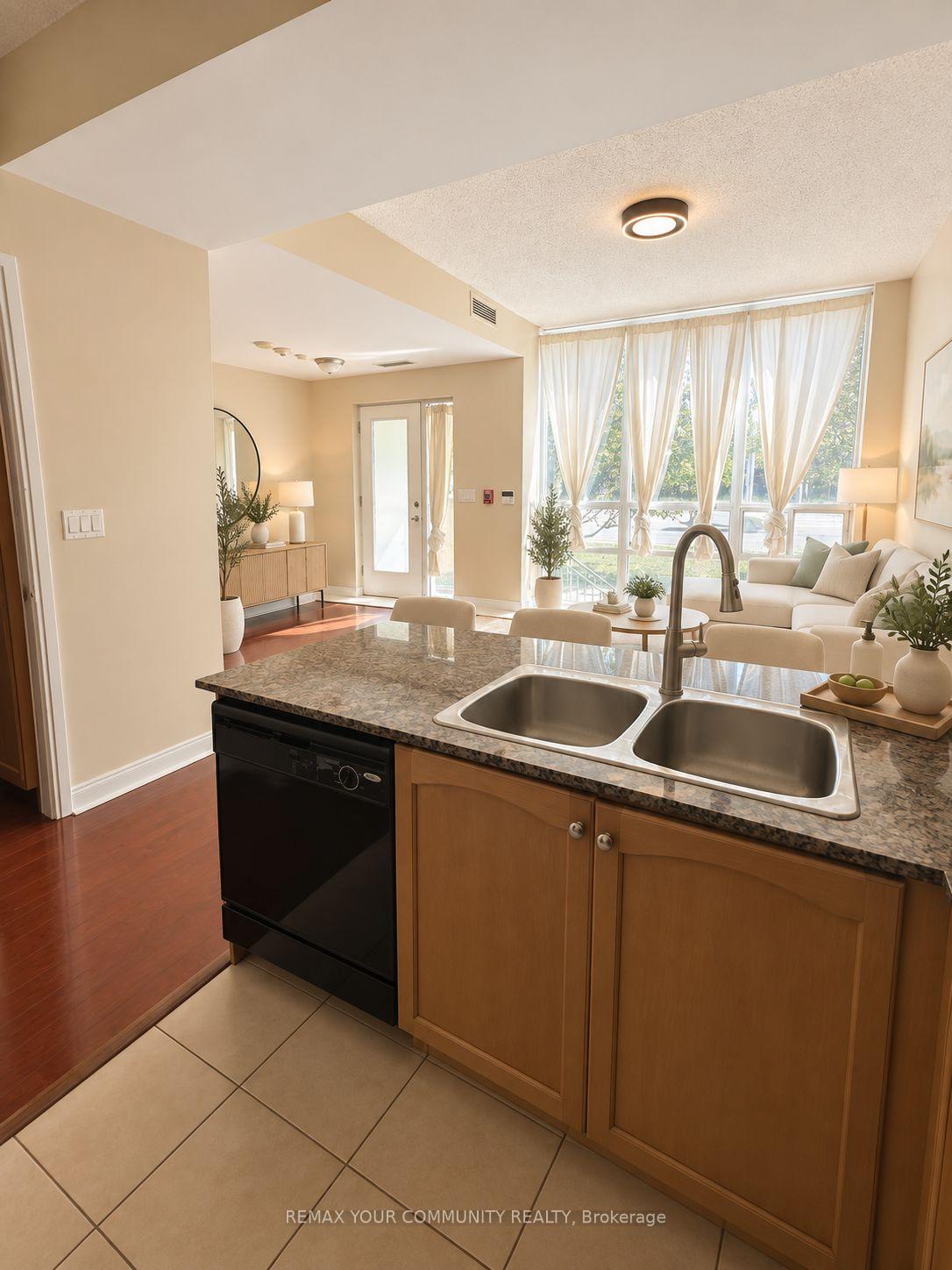Photo 3 of Unit TH 128, 70 Absolute Avenue, Mississauga, City Centre — HOMEH