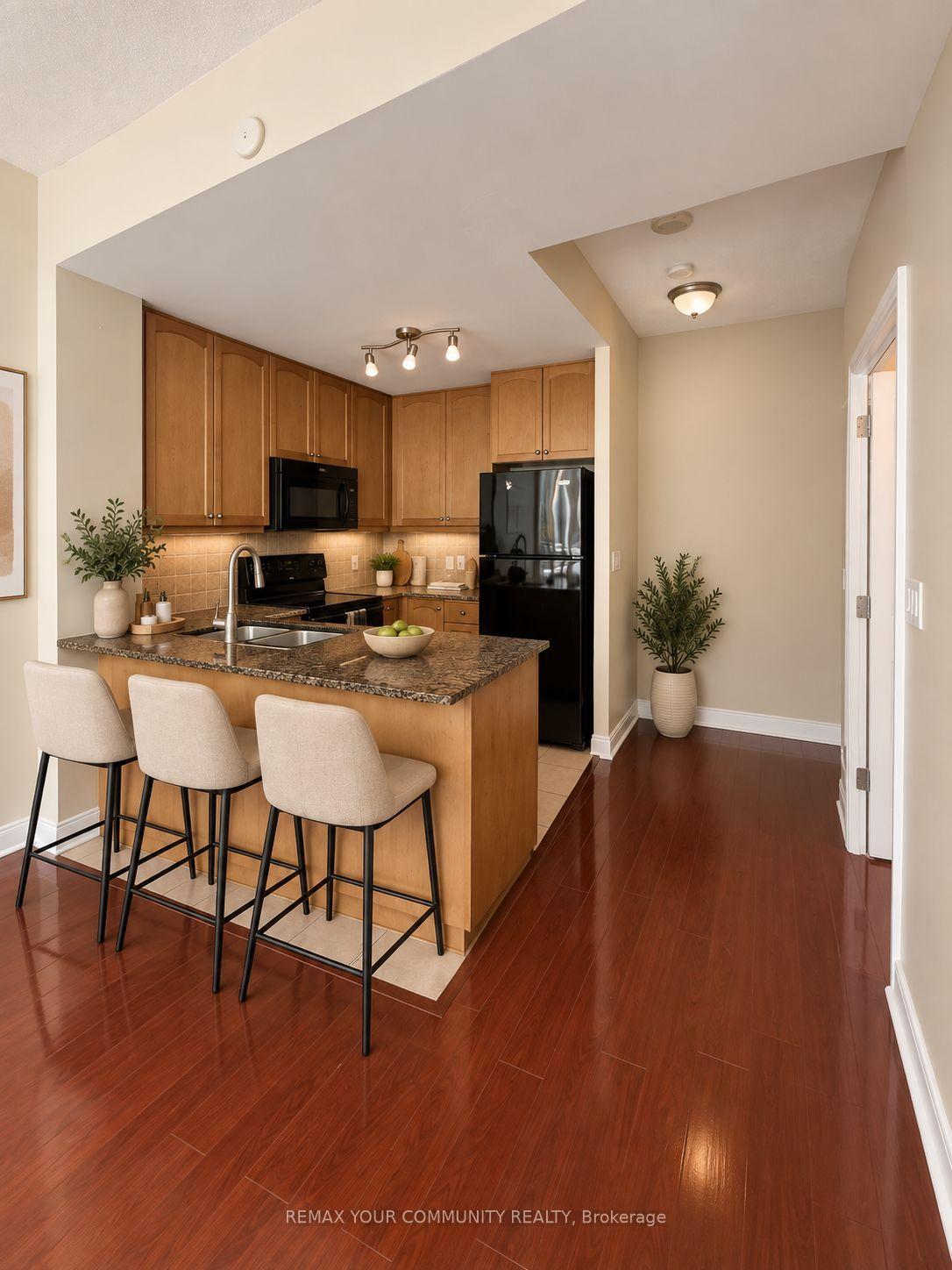 Photo 4 of Unit TH 128, 70 Absolute Avenue, Mississauga, City Centre — HOMEH