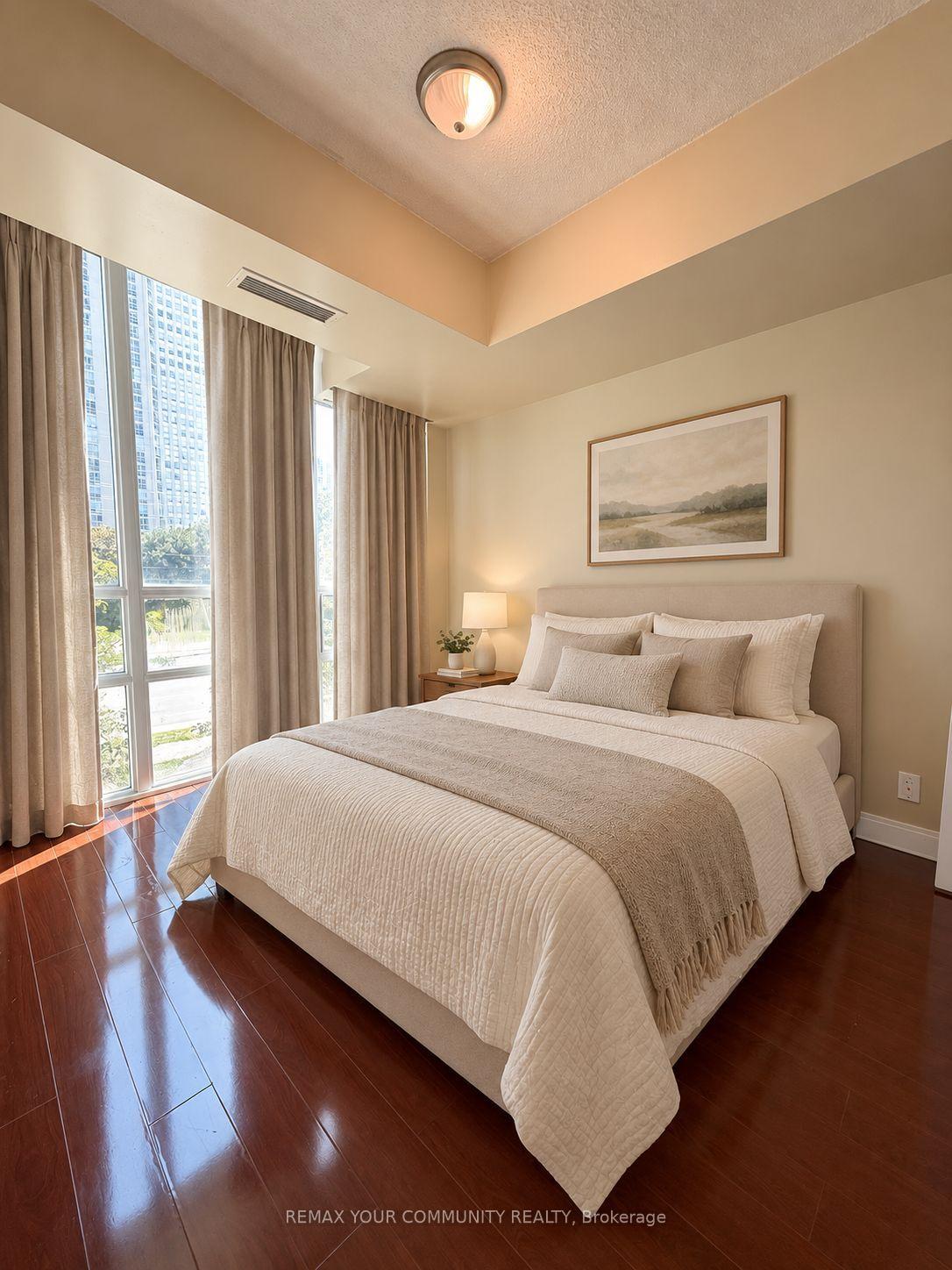 Photo 7 of Unit TH 128, 70 Absolute Avenue, Mississauga, City Centre — HOMEH