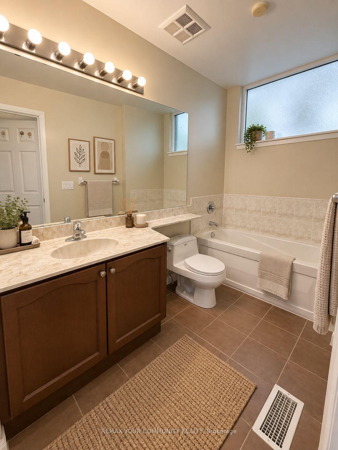 Photo 12 of Unit TH 128, 70 Absolute Avenue, Mississauga, City Centre — HOMEH