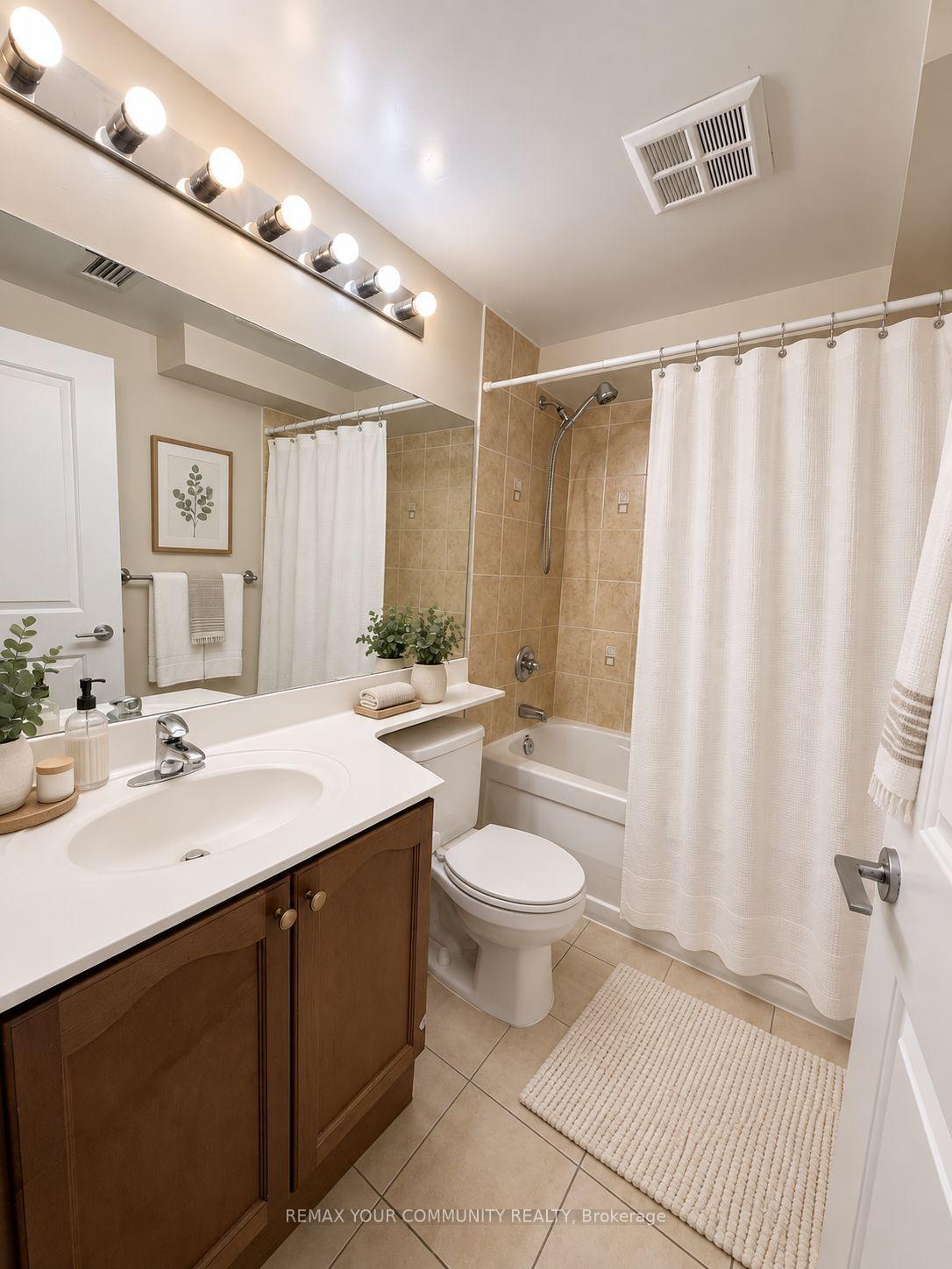 Photo 13 of Unit TH 128, 70 Absolute Avenue, Mississauga, City Centre — HOMEH