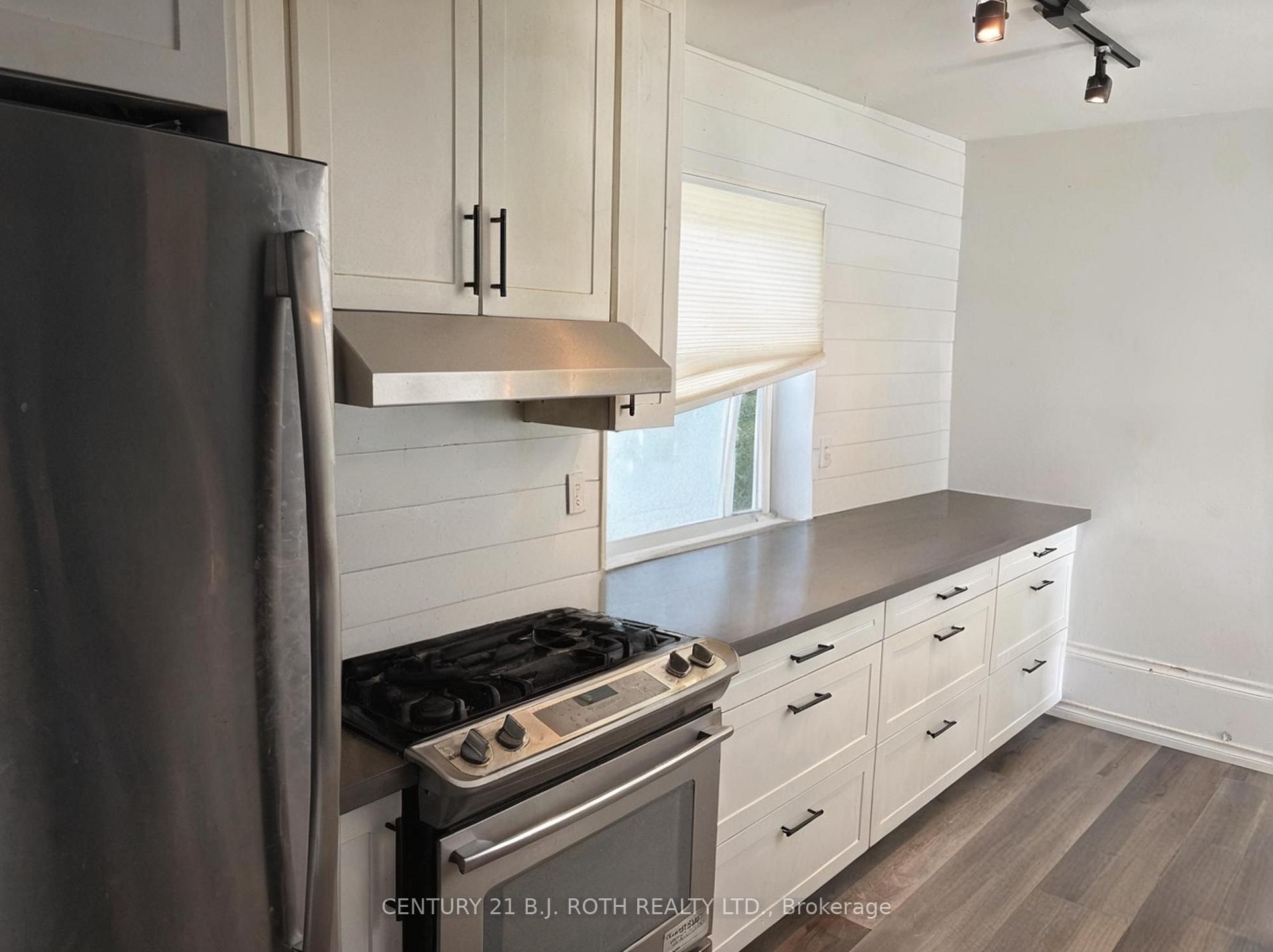 Photo 11 of 253 Dunlop Street E, Barrie, North Shore — HOMEH