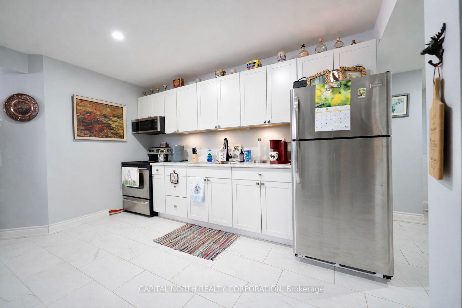 Photo 26 of 8 Downer Crescent, Wasaga Beach — HOMEH
