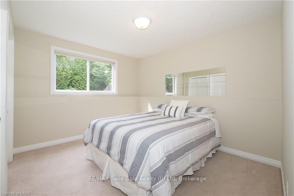 Photo 29 of 559 Springwater Drive, Waterloo, Conservation Meadows — HOMEH