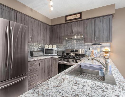 Photo 8 of 296 Millburn Boulevard, Centre Wellington, Fergus — HOMEH