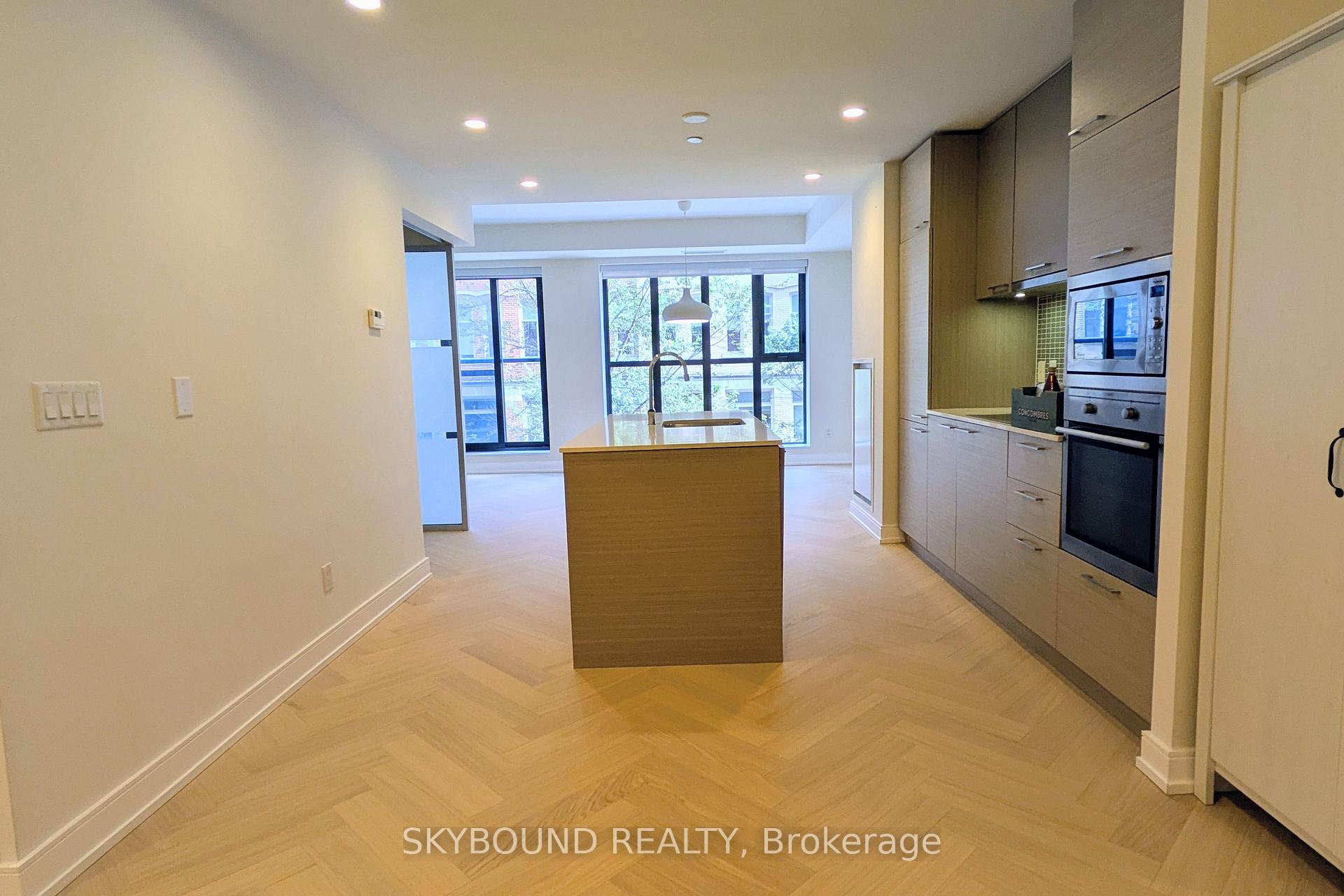 Photo 4 of Unit 304, 55 Front Street E, Toronto, Waterfront Communities — HOMEH