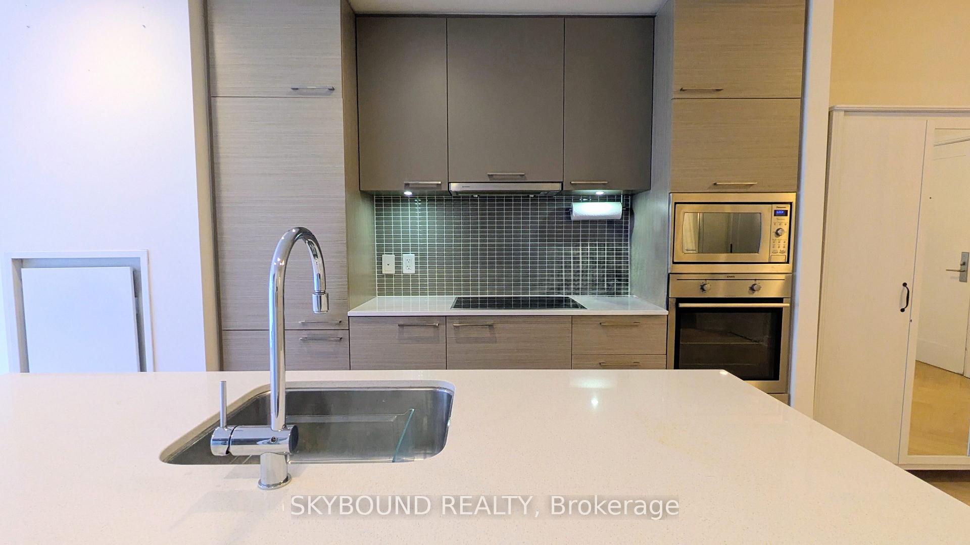 Photo 9 of Unit 304, 55 Front Street E, Toronto, Waterfront Communities — HOMEH