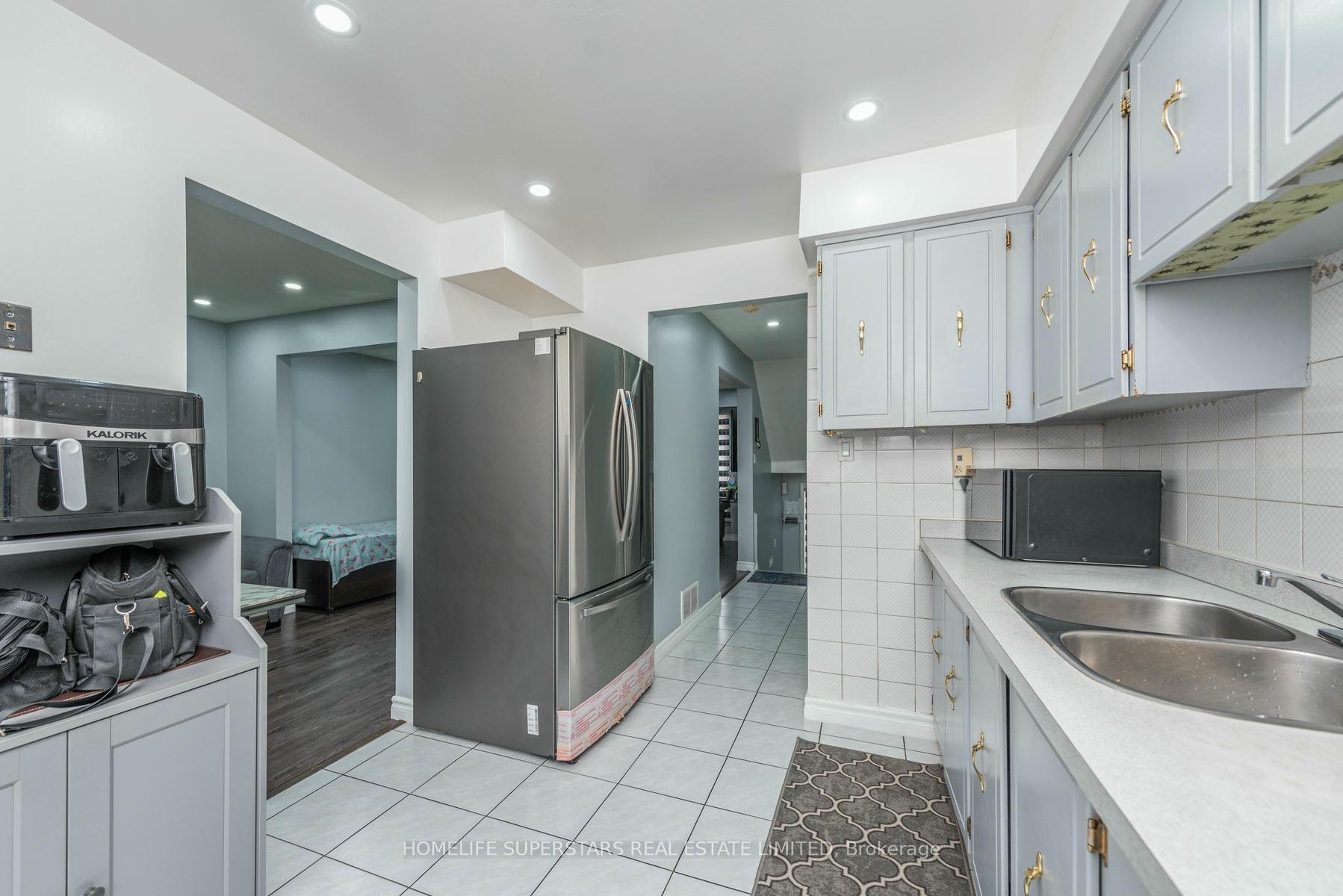 Photo 16 of Unit 50, 7475 Goreway Drive, Mississauga, Malton — HOMEH