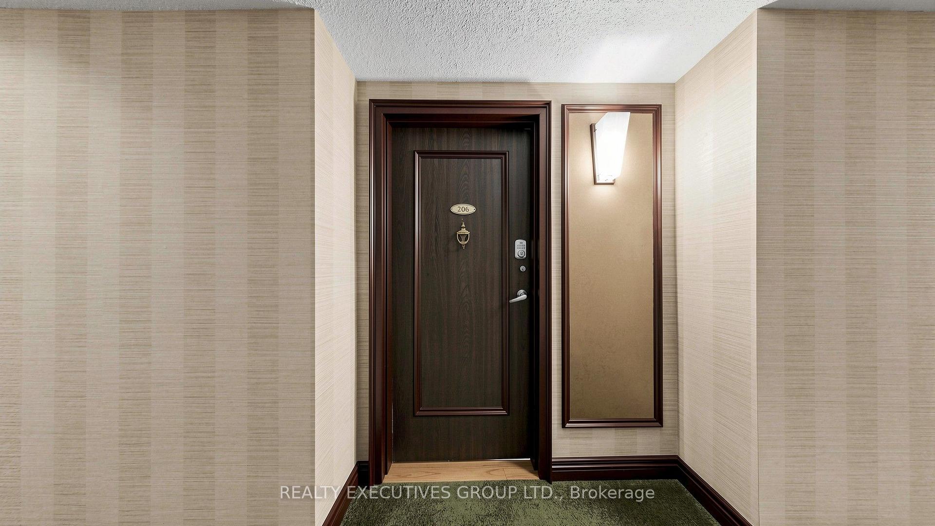 Photo 2 of Unit 206, 8111 Yonge Street, Markham, Royal Orchard — HOMEH