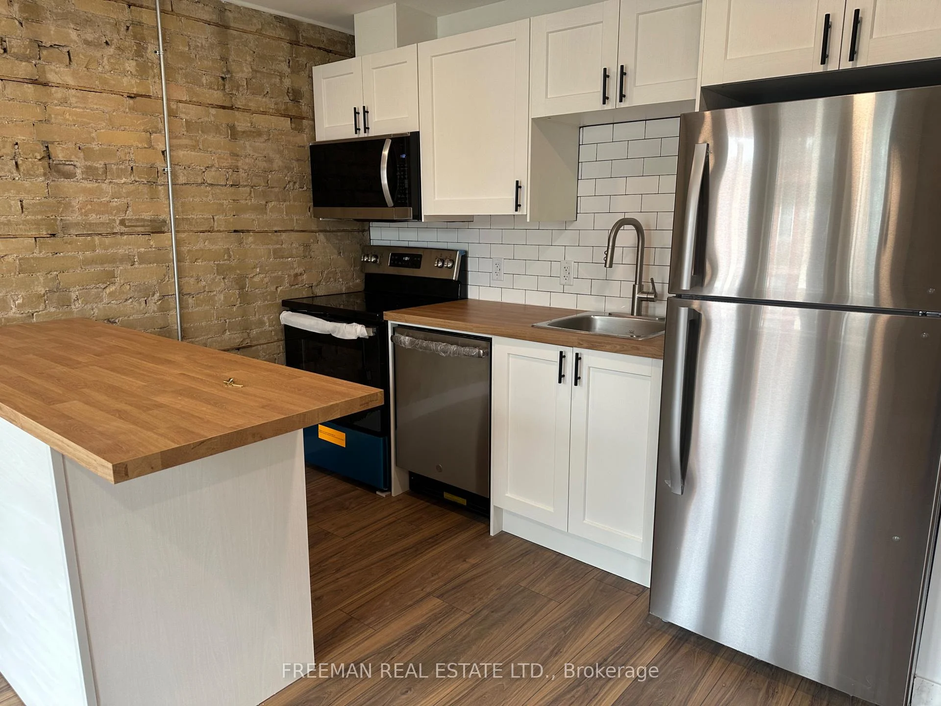 Photo 9 of 1029 Gerrard Street, Toronto, South Riverdale — HOMEH