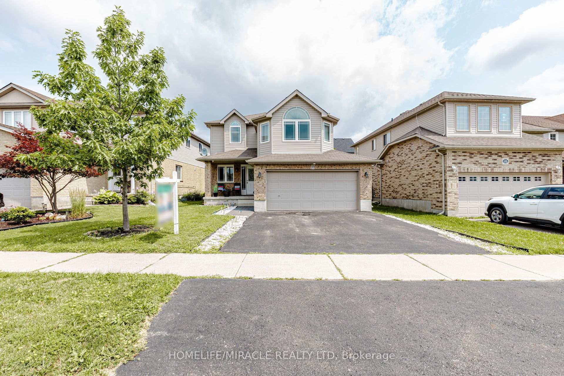Photo 2 of 39 Washburn Drive, Guelph, Grange Road — HOMEH