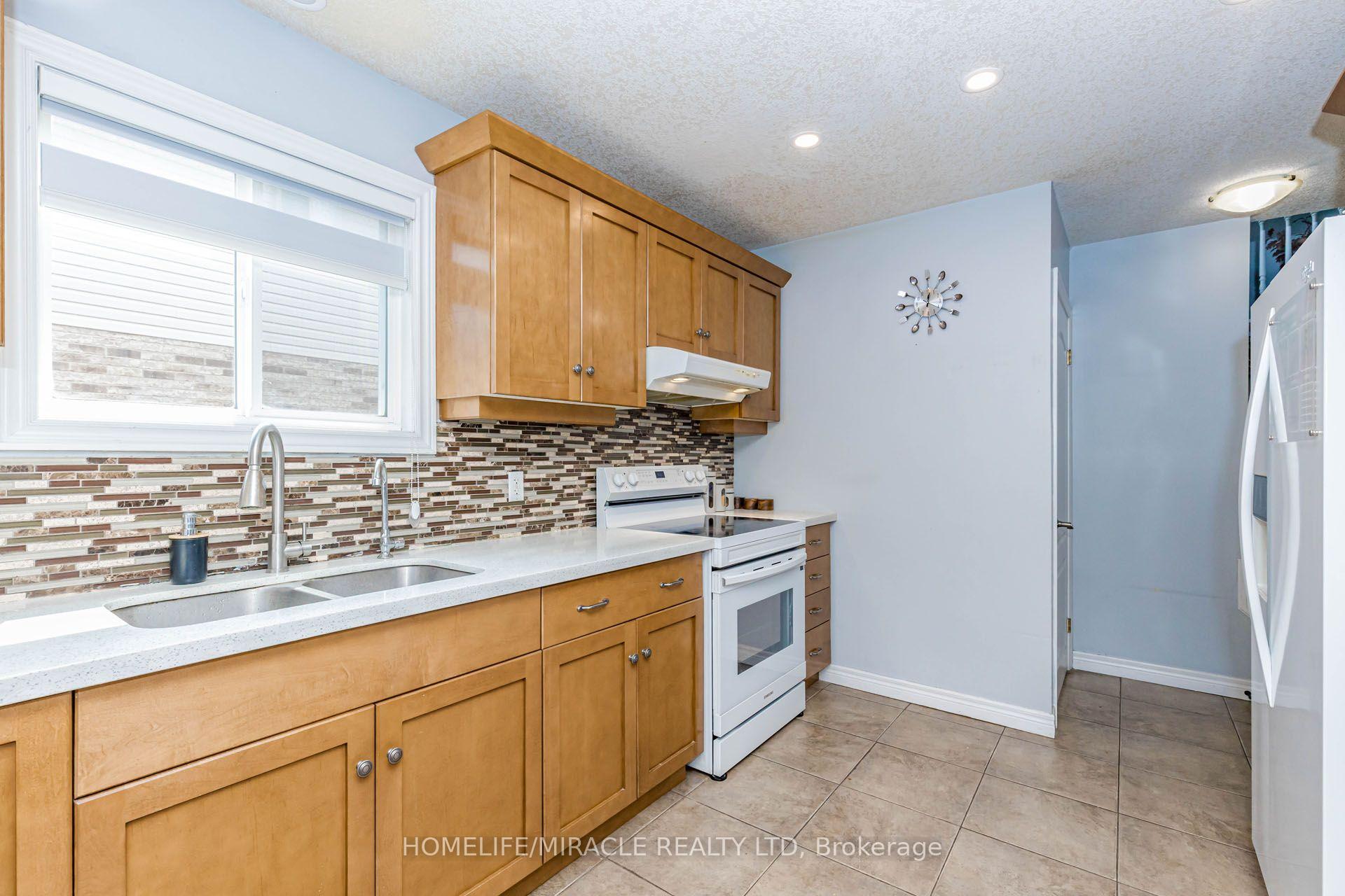 Photo 16 of 39 Washburn Drive, Guelph, Grange Road — HOMEH