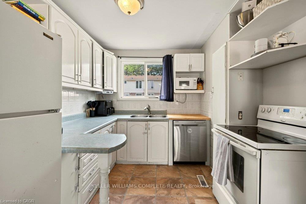 Photo 12 of Unit 14, 120 Quigley Road, Hamilton, Vincent — HOMEH