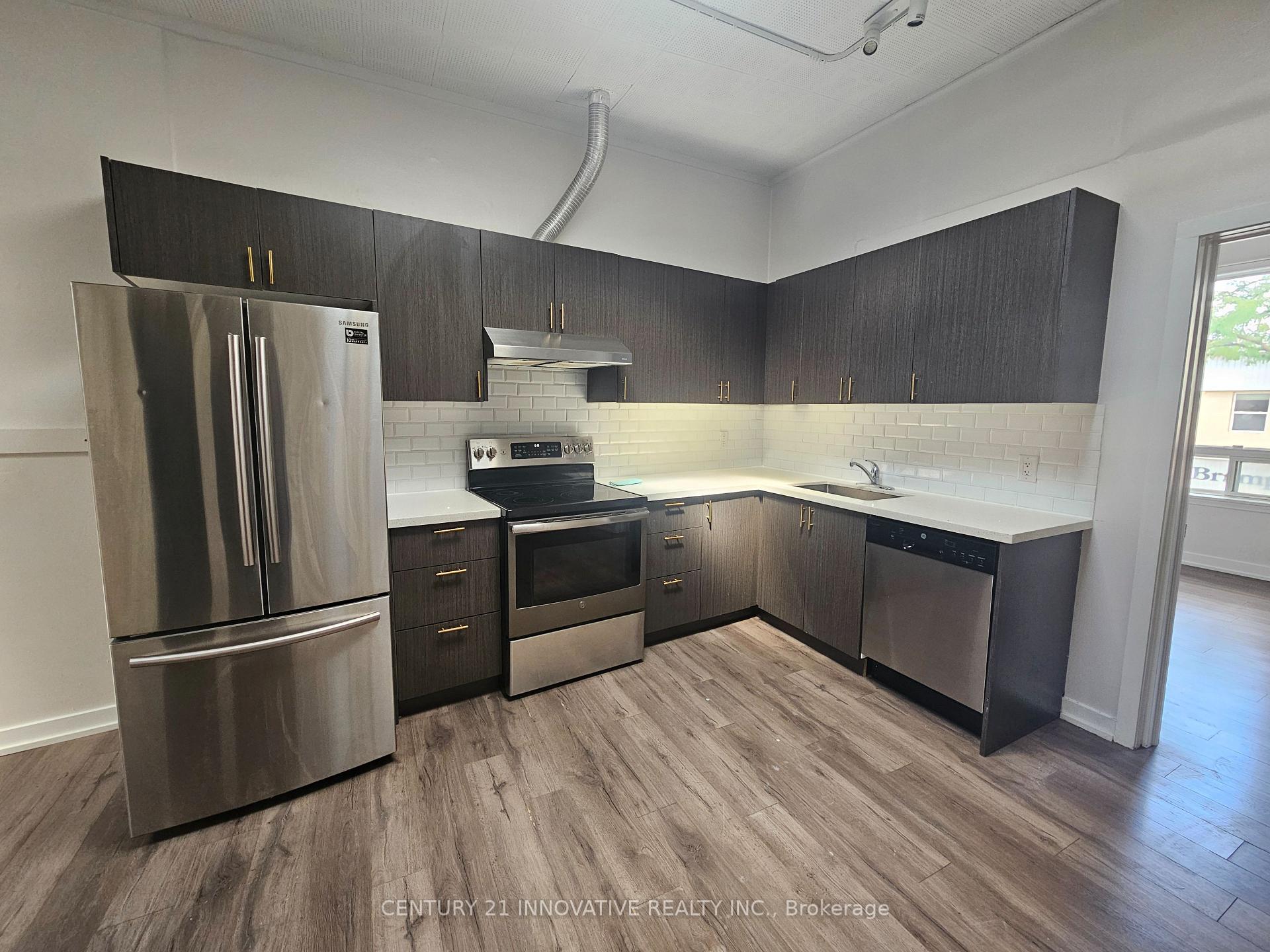 Photo 2 of Unit 102, 75 Main Street N, Brampton, Downtown Brampton — HOMEH