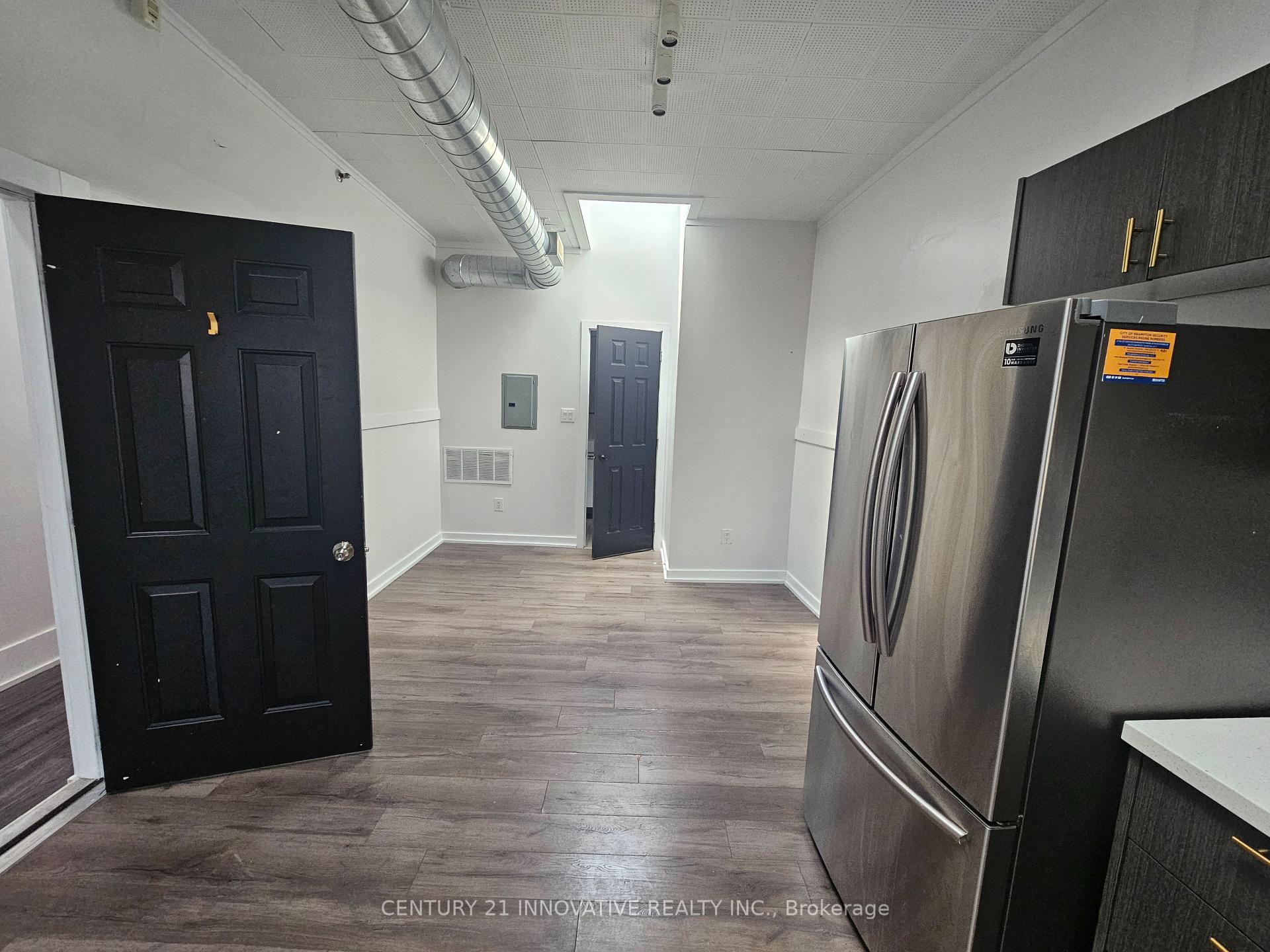 Photo 3 of Unit 102, 75 Main Street N, Brampton, Downtown Brampton — HOMEH