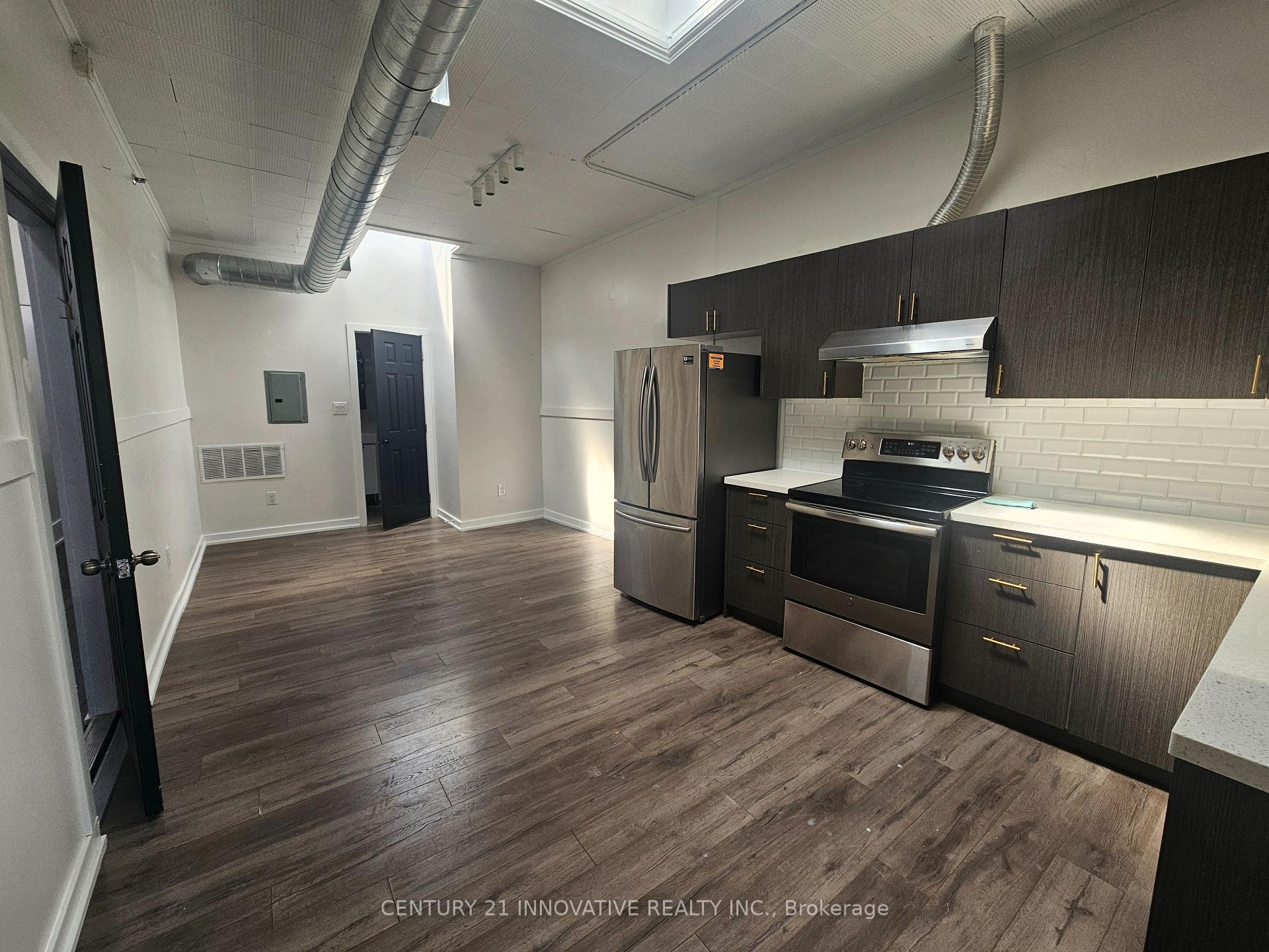 Photo 4 of Unit 102, 75 Main Street N, Brampton, Downtown Brampton — HOMEH
