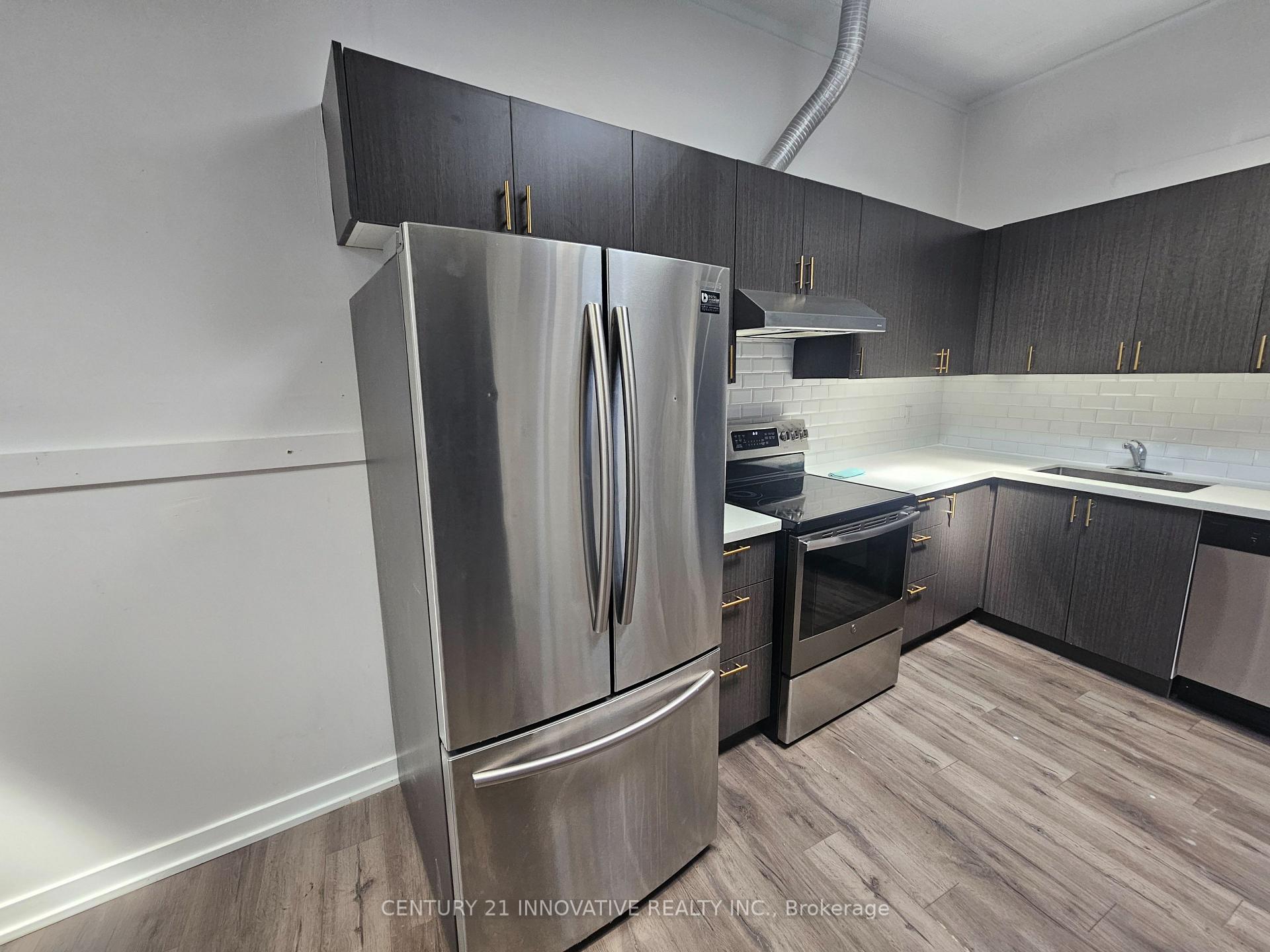 Photo 7 of Unit 102, 75 Main Street N, Brampton, Downtown Brampton — HOMEH