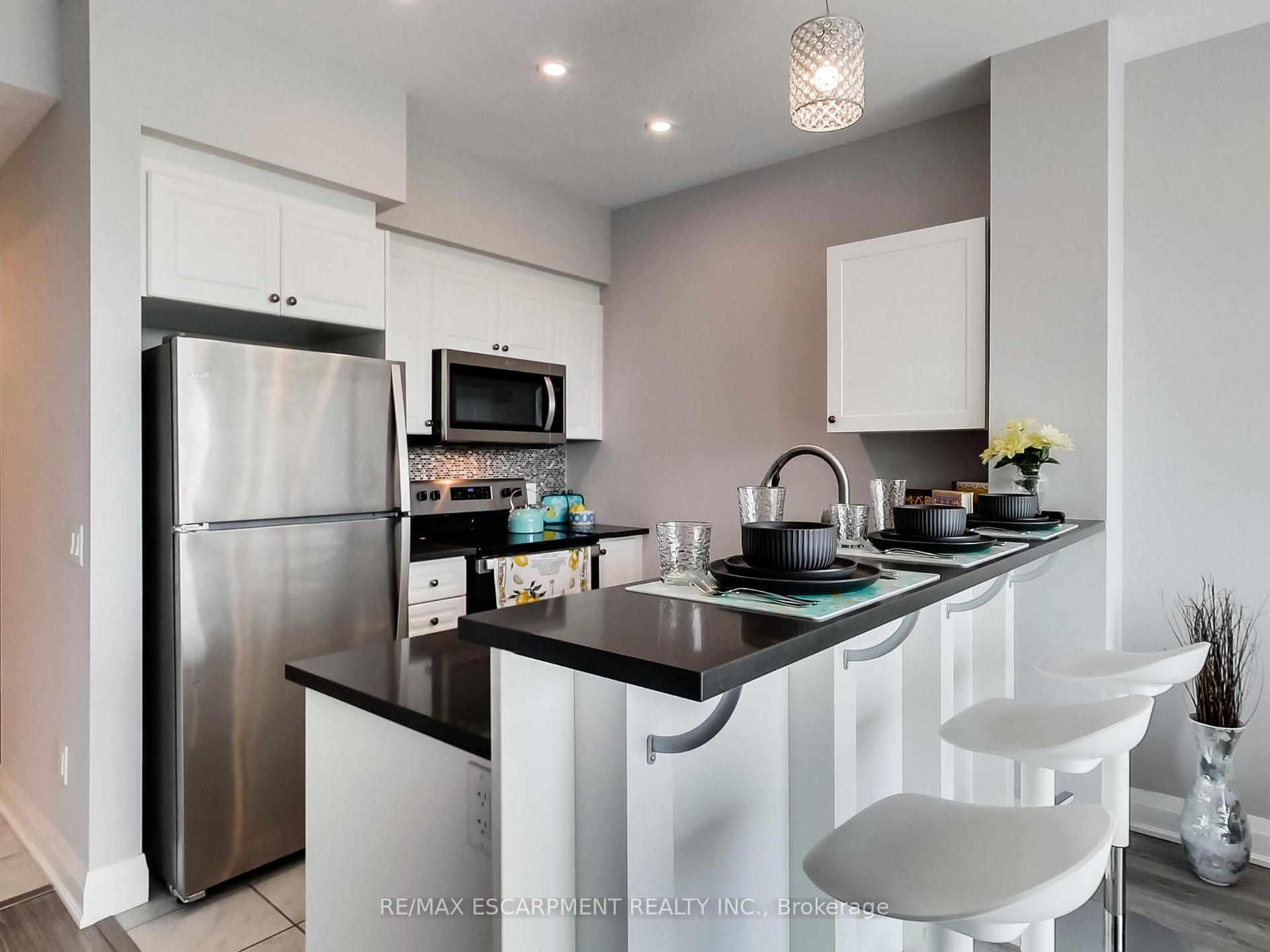 Photo 16 of Unit 318, 16 Concord Place, Grimsby, Grimsby Beach — HOMEH