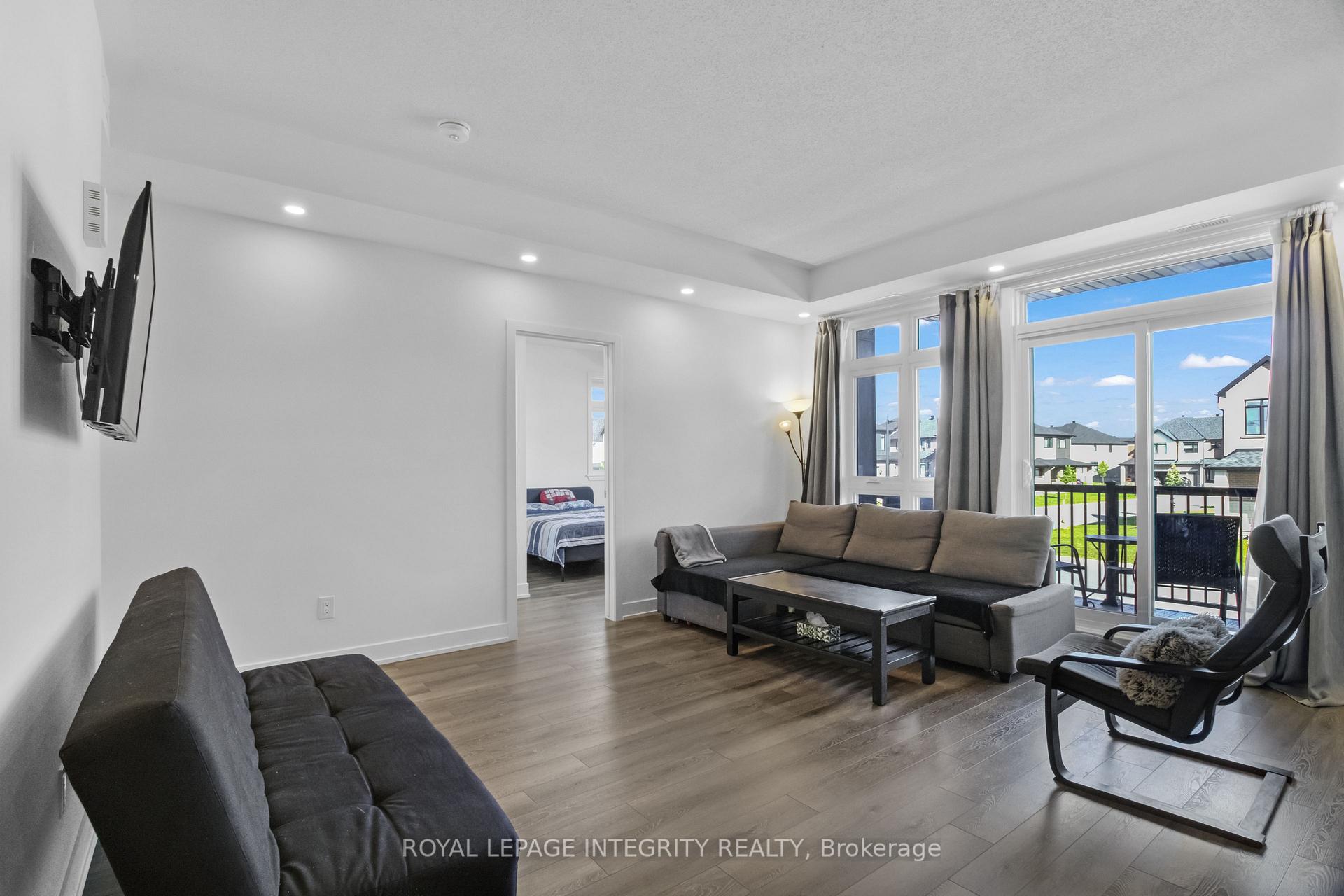 Photo 7 of Unit Unit # H, 55 Overberg Way, Ottawa, Kanata - Emerald Meadows/Trailwest — HOMEH