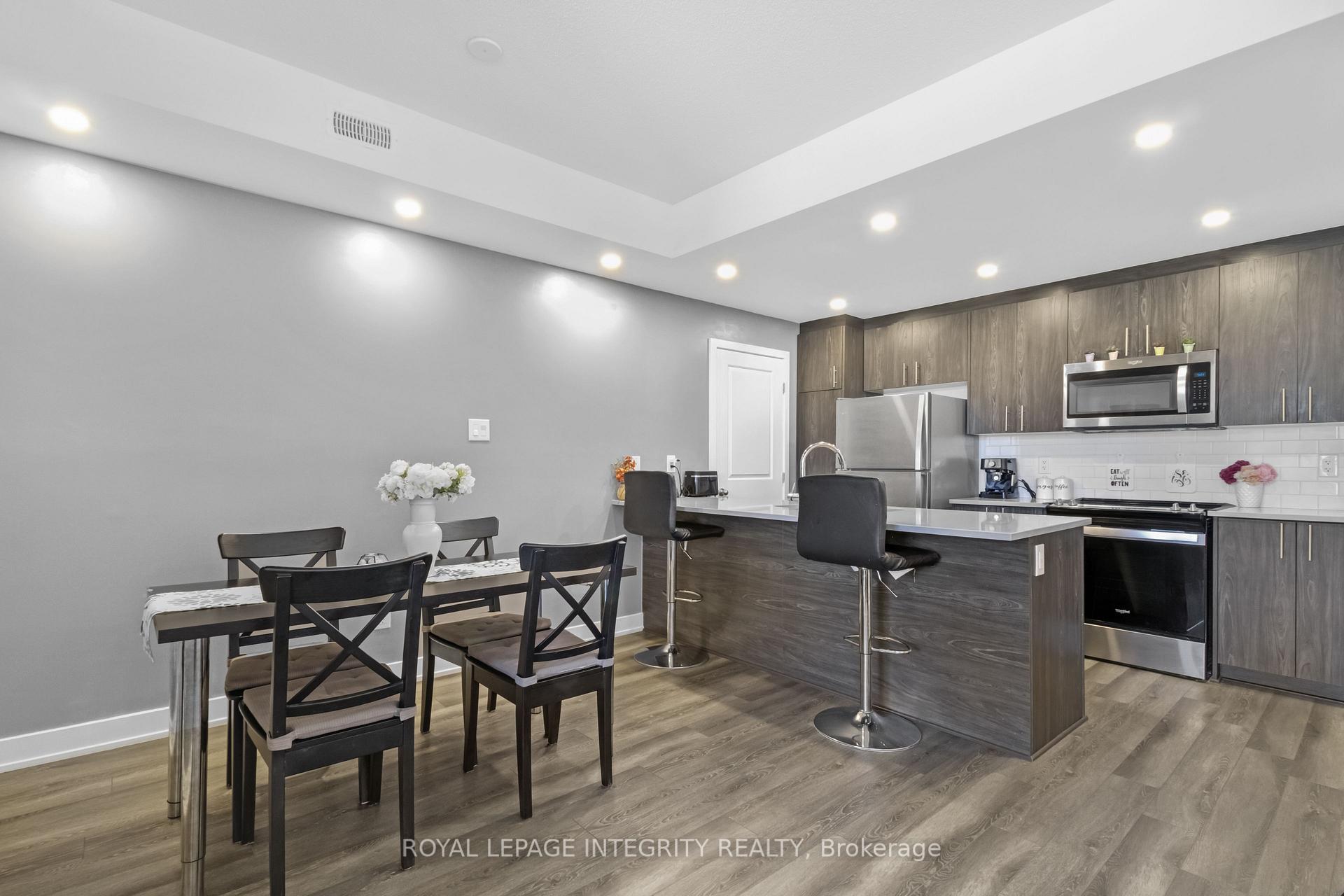 Photo 8 of Unit Unit # H, 55 Overberg Way, Ottawa, Kanata - Emerald Meadows/Trailwest — HOMEH