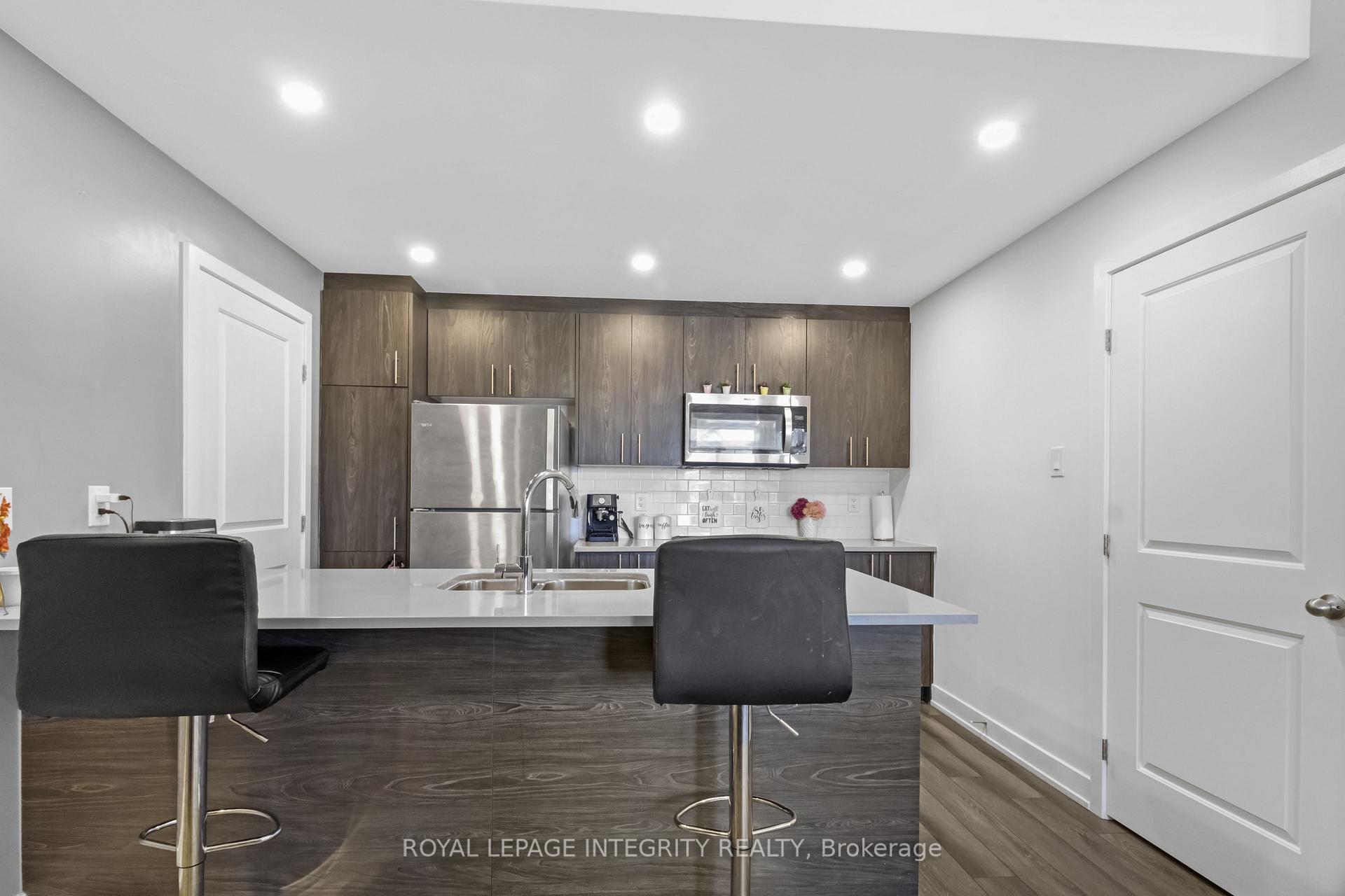 Photo 9 of Unit Unit # H, 55 Overberg Way, Ottawa, Kanata - Emerald Meadows/Trailwest — HOMEH