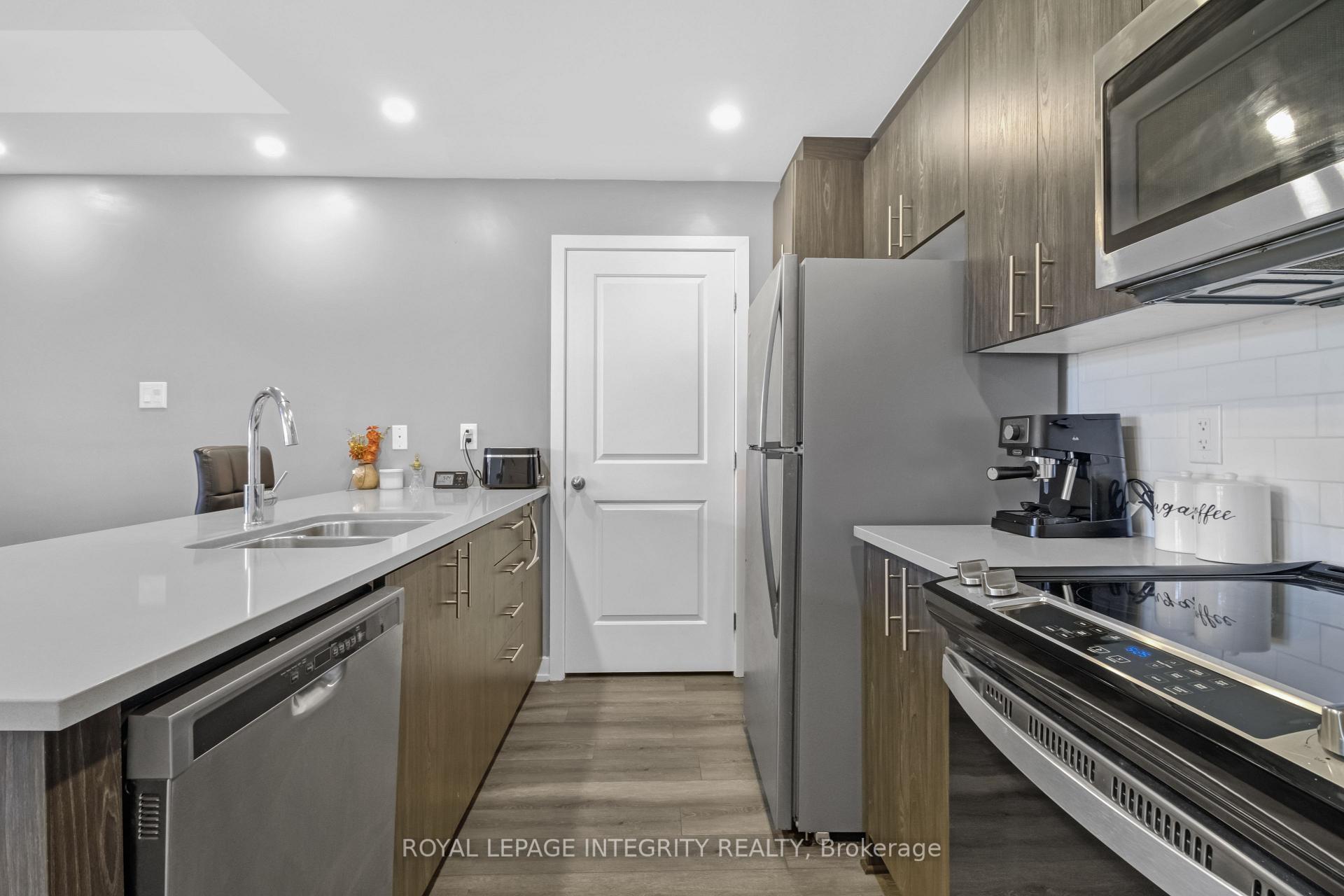 Photo 11 of Unit Unit # H, 55 Overberg Way, Ottawa, Kanata - Emerald Meadows/Trailwest — HOMEH