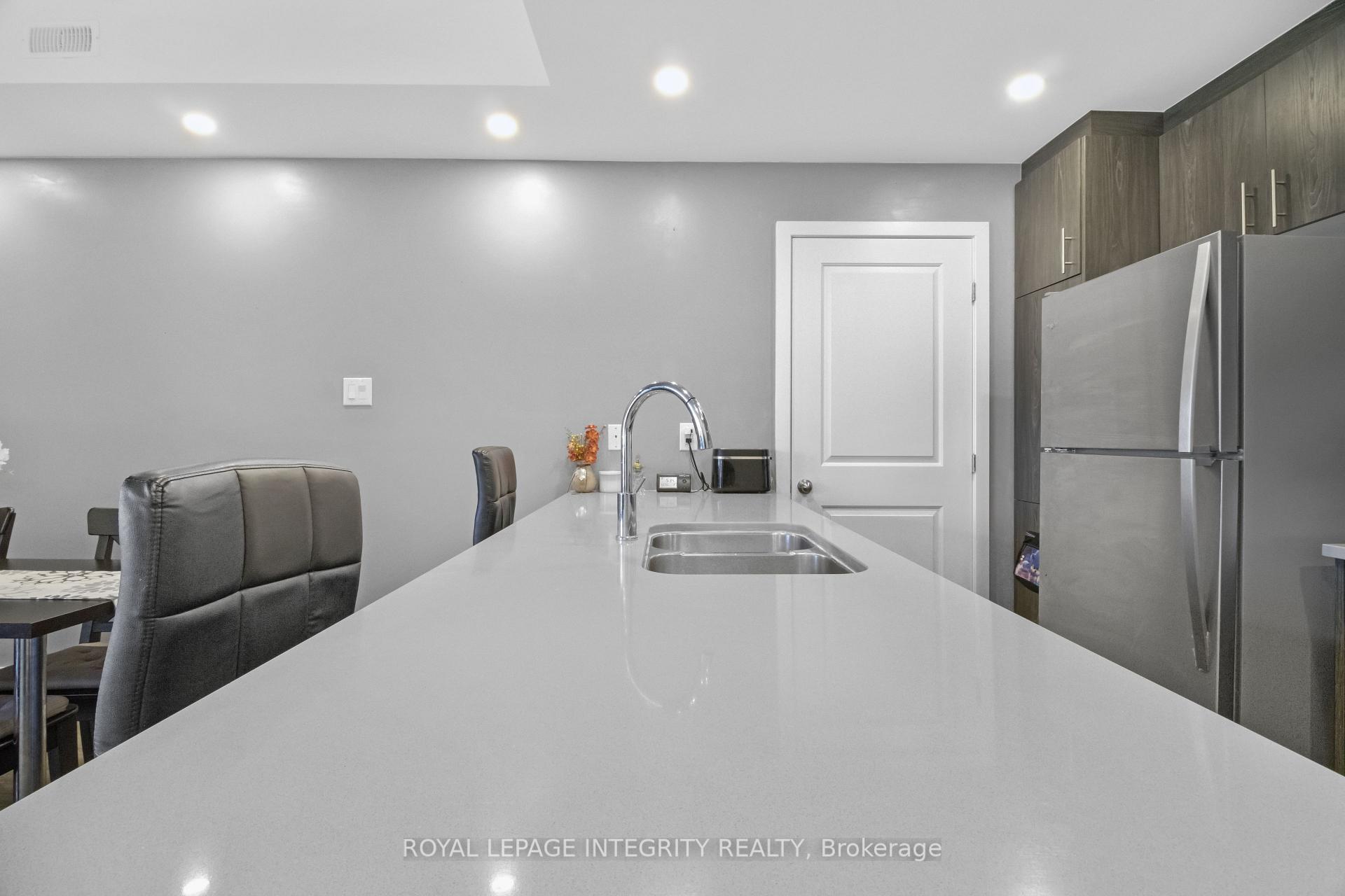 Photo 12 of Unit Unit # H, 55 Overberg Way, Ottawa, Kanata - Emerald Meadows/Trailwest — HOMEH