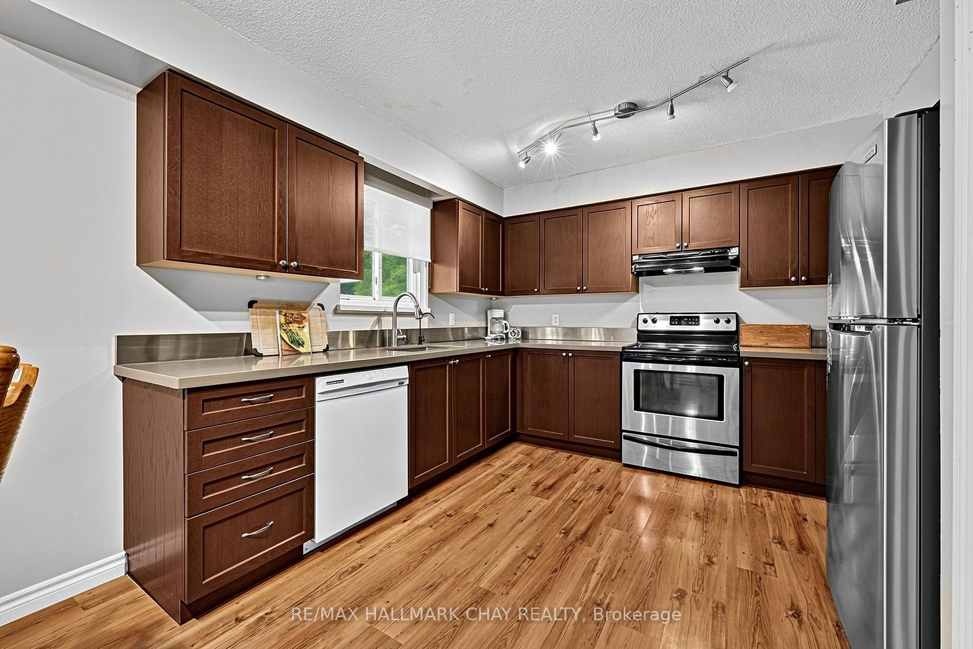 Photo 13 of 1475 River Road W, Wasaga Beach — HOMEH
