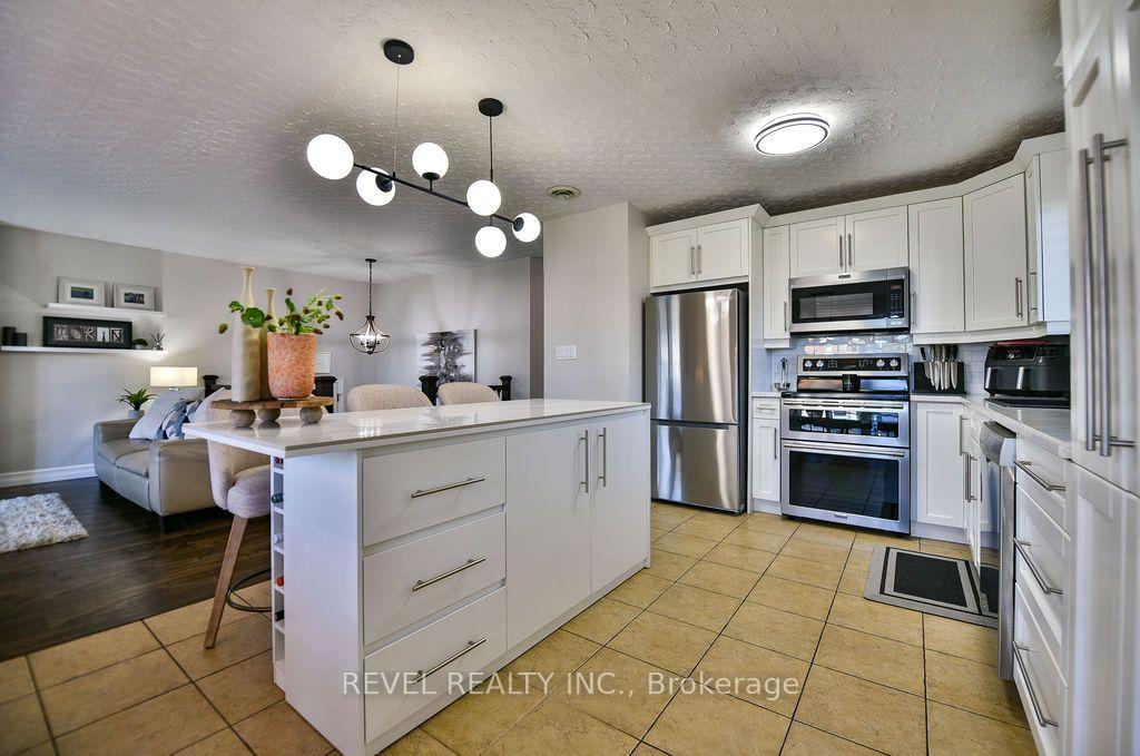 Photo 17 of 441 Kellyann Drive, Timmins, TNW - Riverpark — HOMEH
