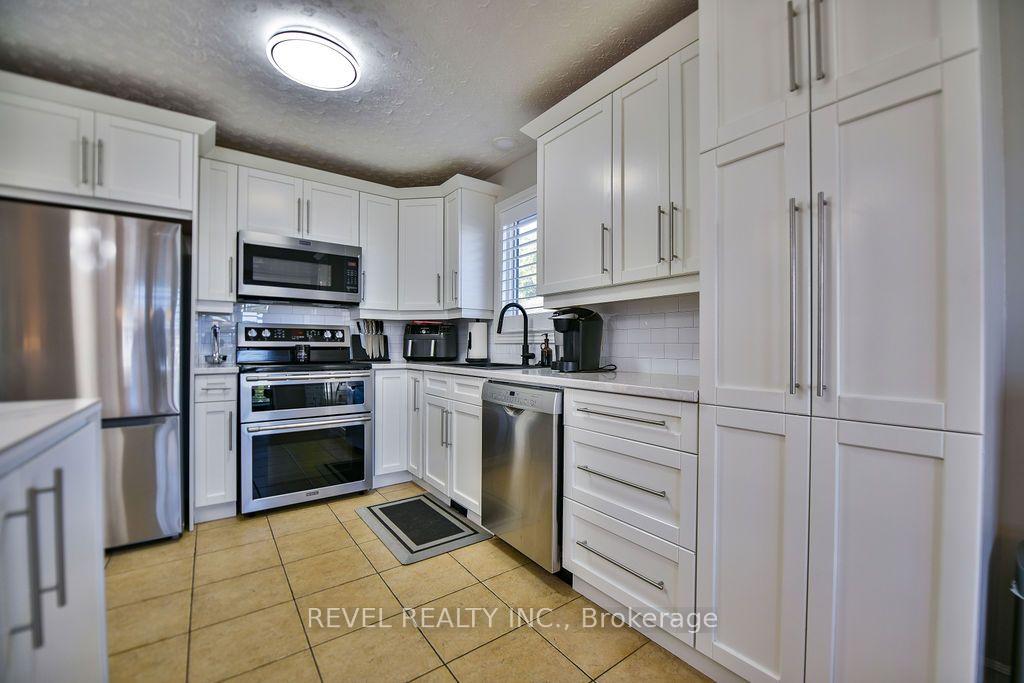 Photo 18 of 441 Kellyann Drive, Timmins, TNW - Riverpark — HOMEH