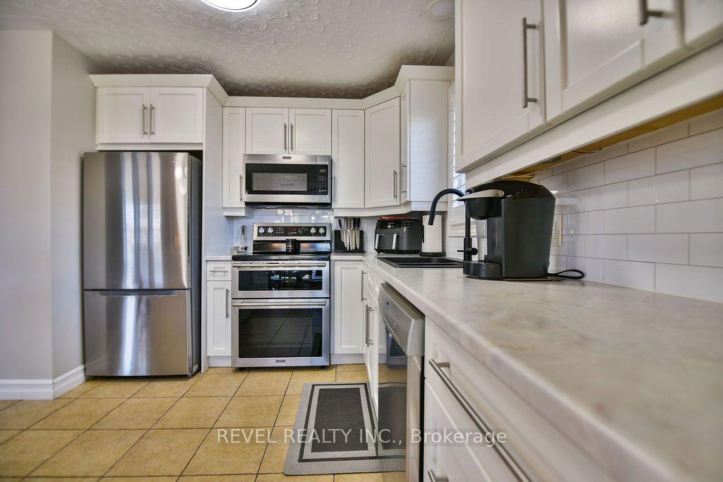 Photo 19 of 441 Kellyann Drive, Timmins, TNW - Riverpark — HOMEH