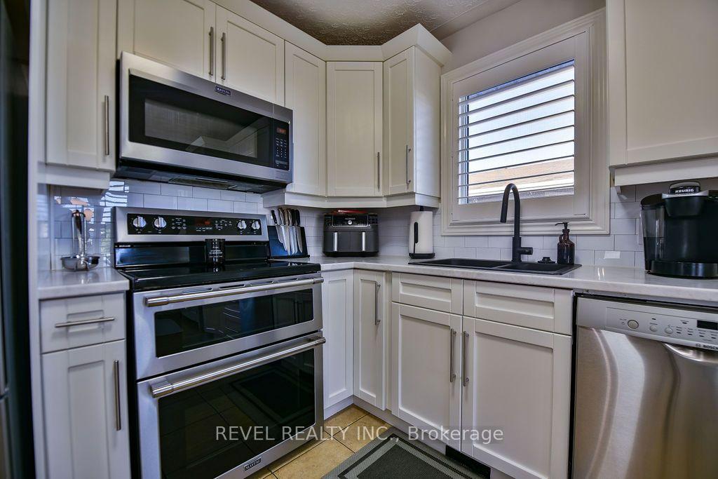 Photo 20 of 441 Kellyann Drive, Timmins, TNW - Riverpark — HOMEH