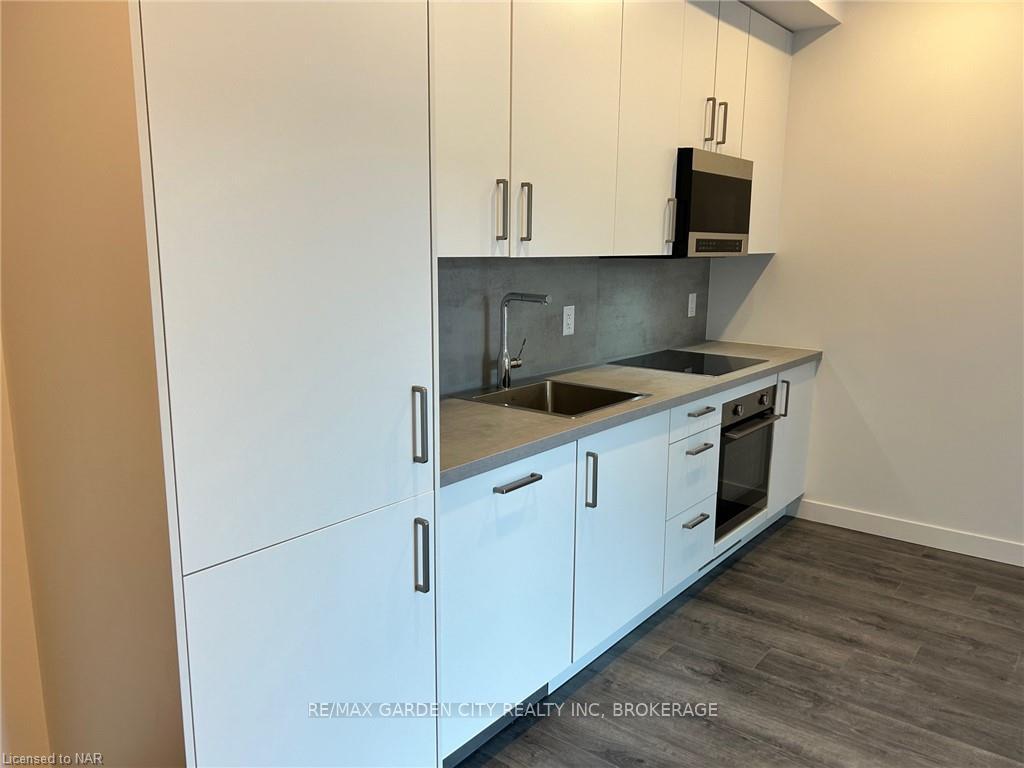 Photo 4 of Unit 213, 7549B Kalar Road, Niagara Falls, Brown — HOMEH