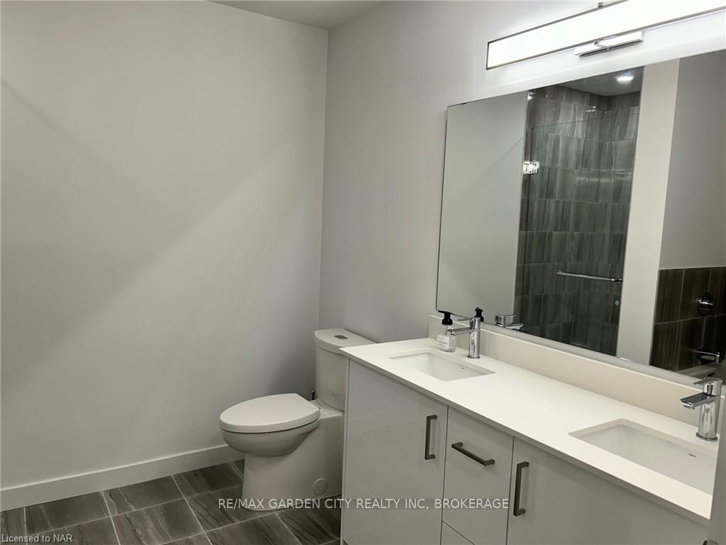 Photo 17 of Unit 213, 7549B Kalar Road, Niagara Falls, Brown — HOMEH