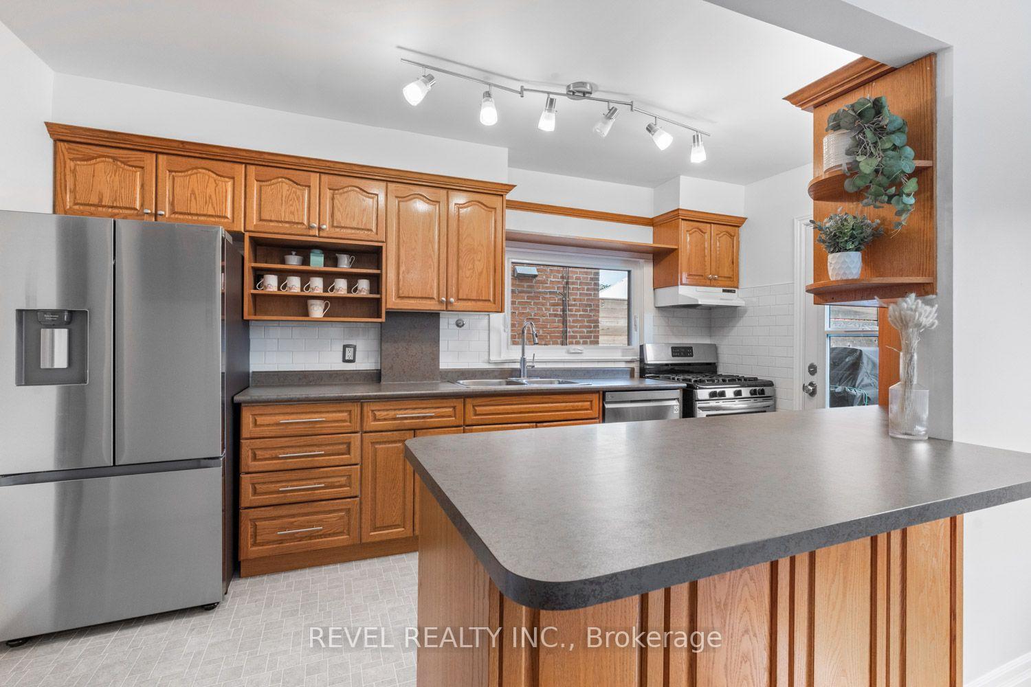 Photo 6 of 165 Northcliffe Boulevard, Toronto, Oakwood Village — HOMEH