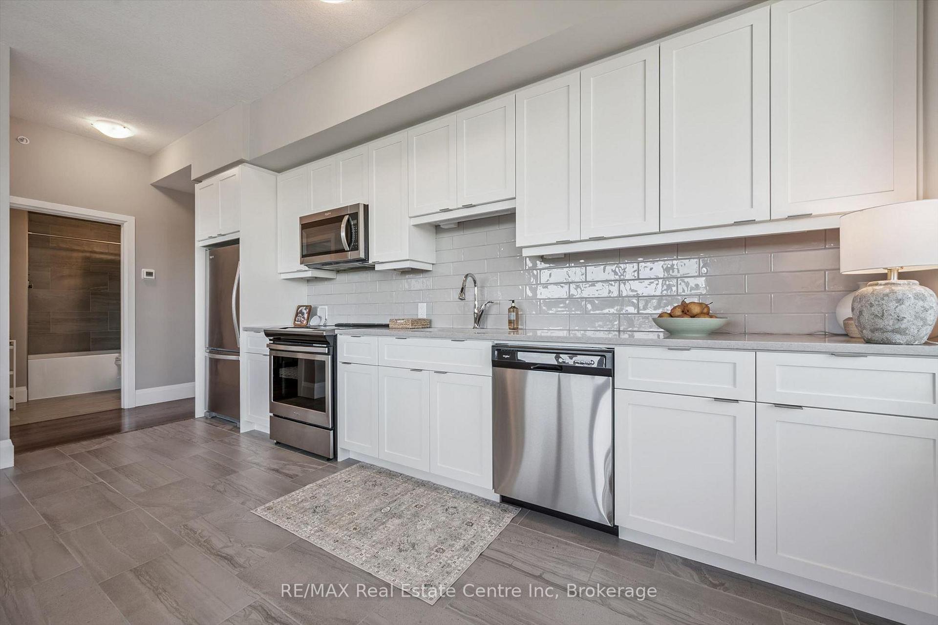 Photo 11 of Unit 402, 73 Arthur Street S, Guelph, Downtown — HOMEH
