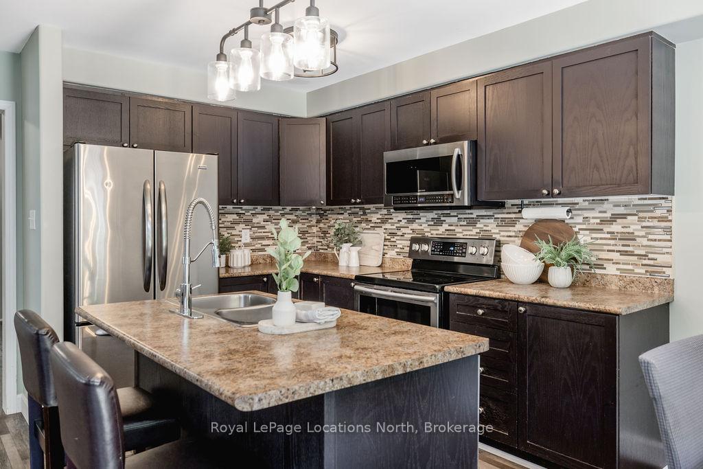 Photo 9 of 67 Wesley Avenue, Wasaga Beach — HOMEH