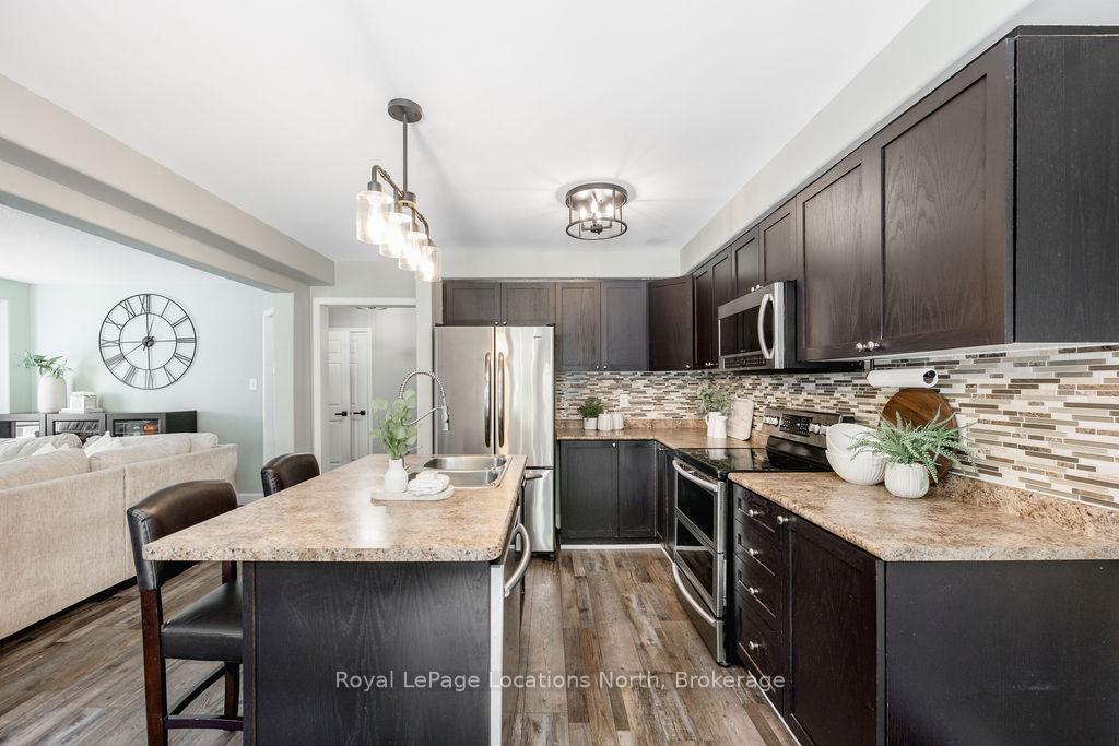 Photo 10 of 67 Wesley Avenue, Wasaga Beach — HOMEH