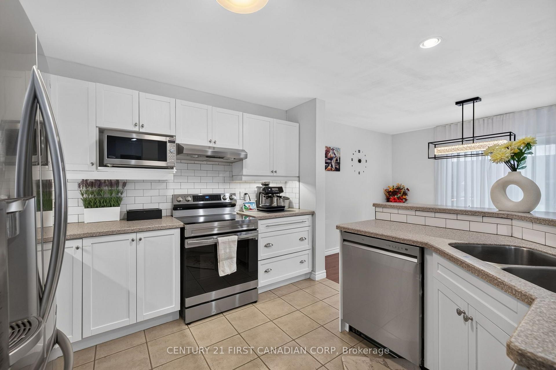 Photo 18 of 1213 Smither Road, London, North I — HOMEH