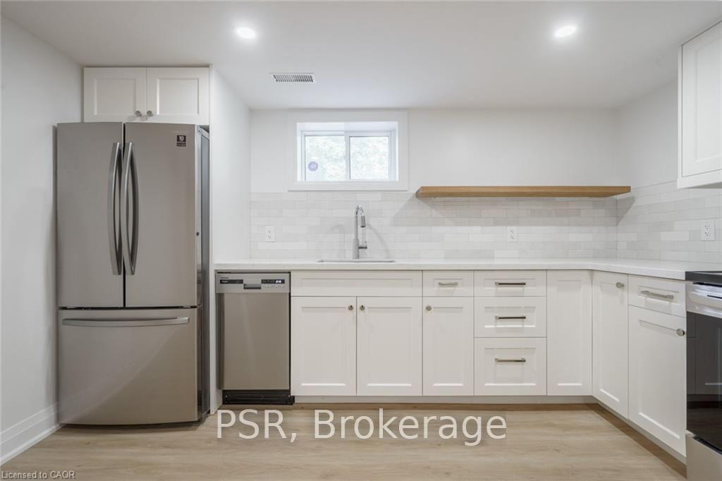 Photo 23 of Unit Lower, 5678 Woodland Boulevard, Niagara Falls, Hospital — HOMEH