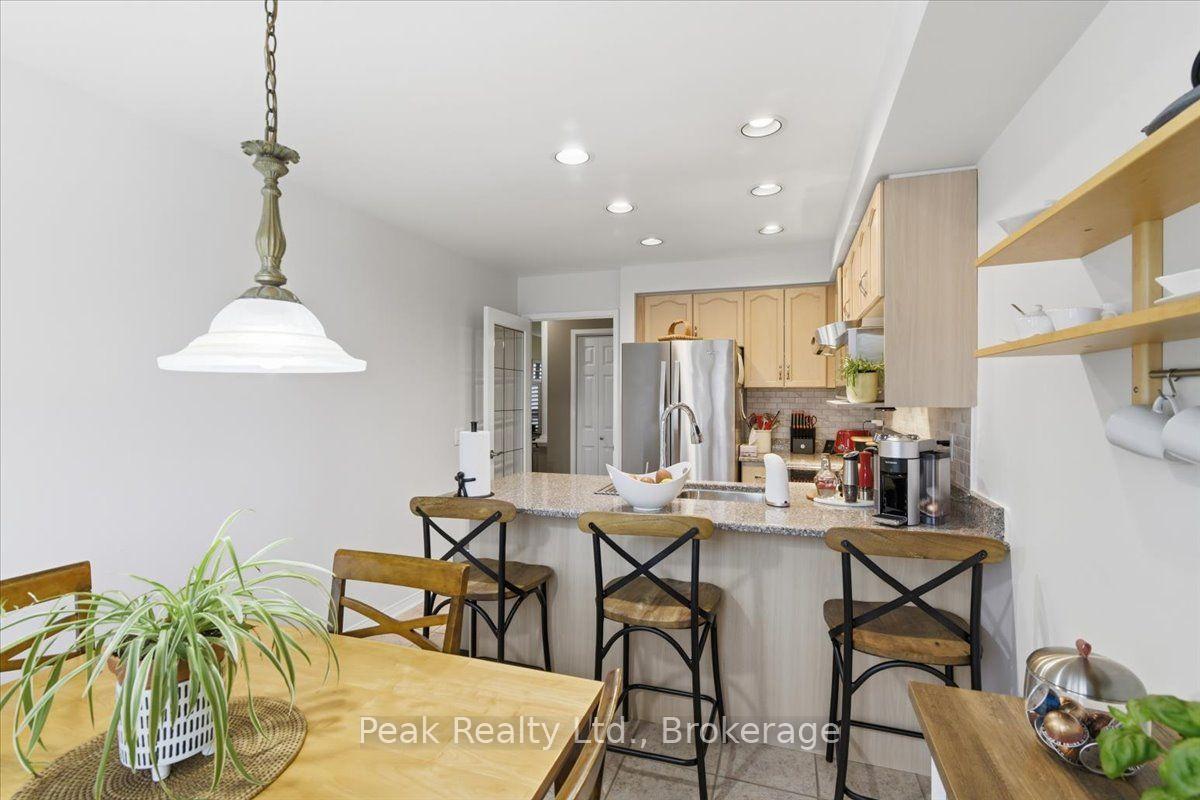 Photo 10 of Unit 102, 9800 Mclaughlin Road N, Brampton, Fletcher's Creek Village — HOMEH