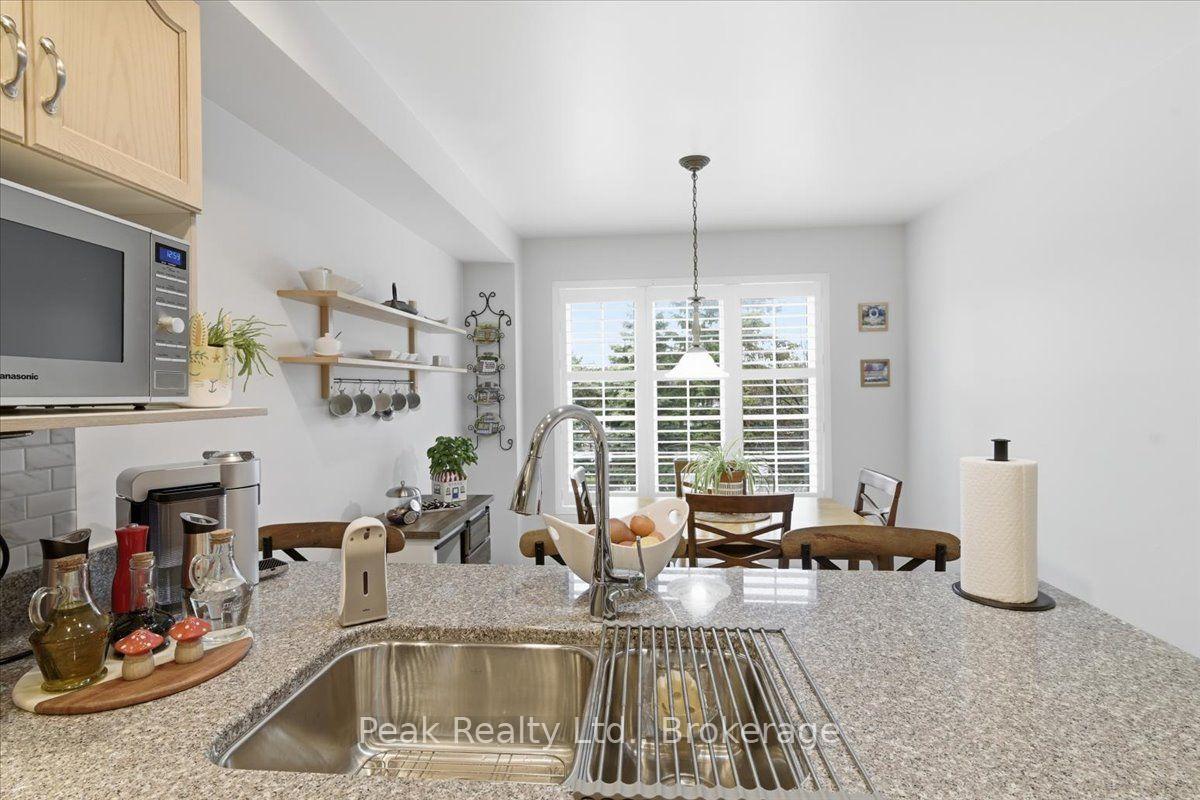 Photo 11 of Unit 102, 9800 Mclaughlin Road N, Brampton, Fletcher's Creek Village — HOMEH