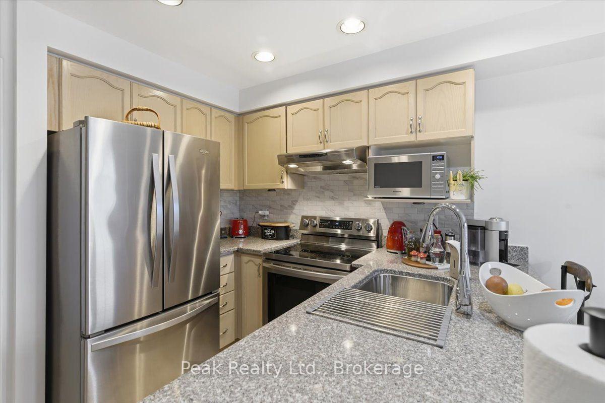 Photo 12 of Unit 102, 9800 Mclaughlin Road N, Brampton, Fletcher's Creek Village — HOMEH